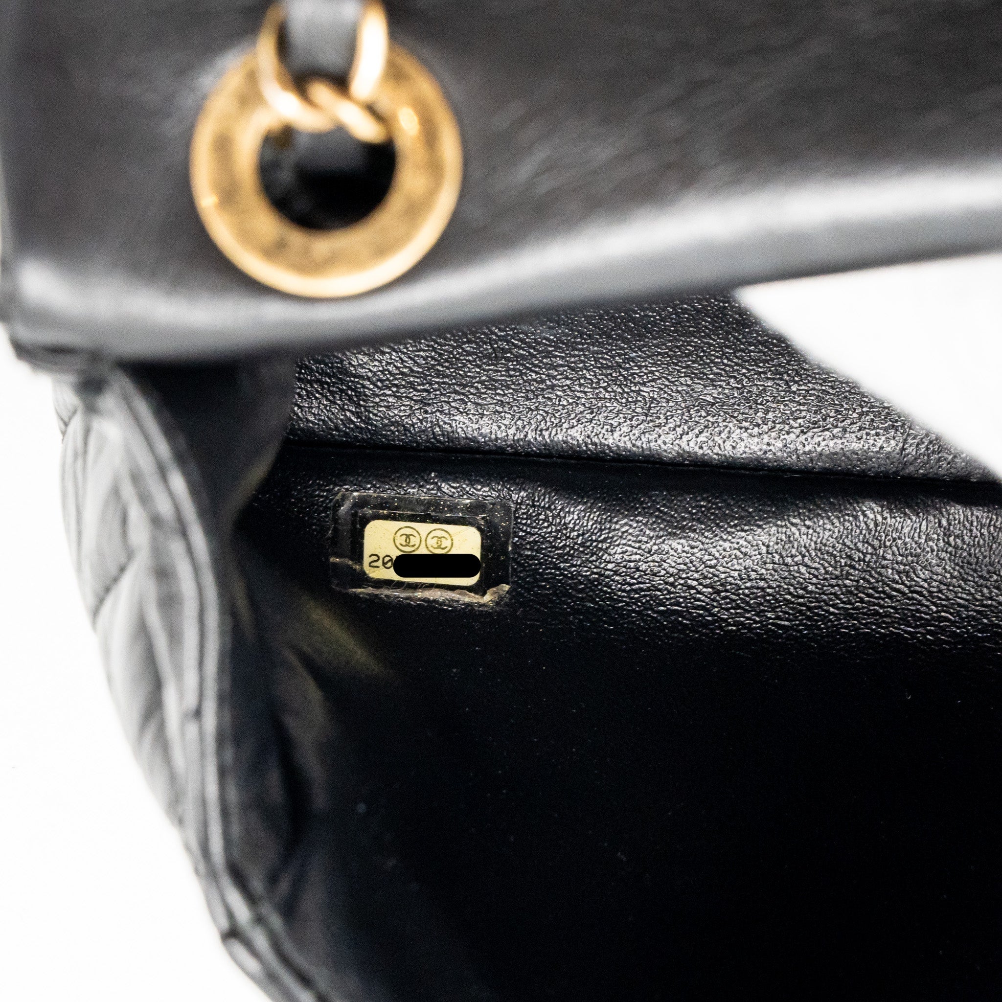 chanel-medallion-quilted-flap-bag-aged-calfskin-black-multicolour-hardware