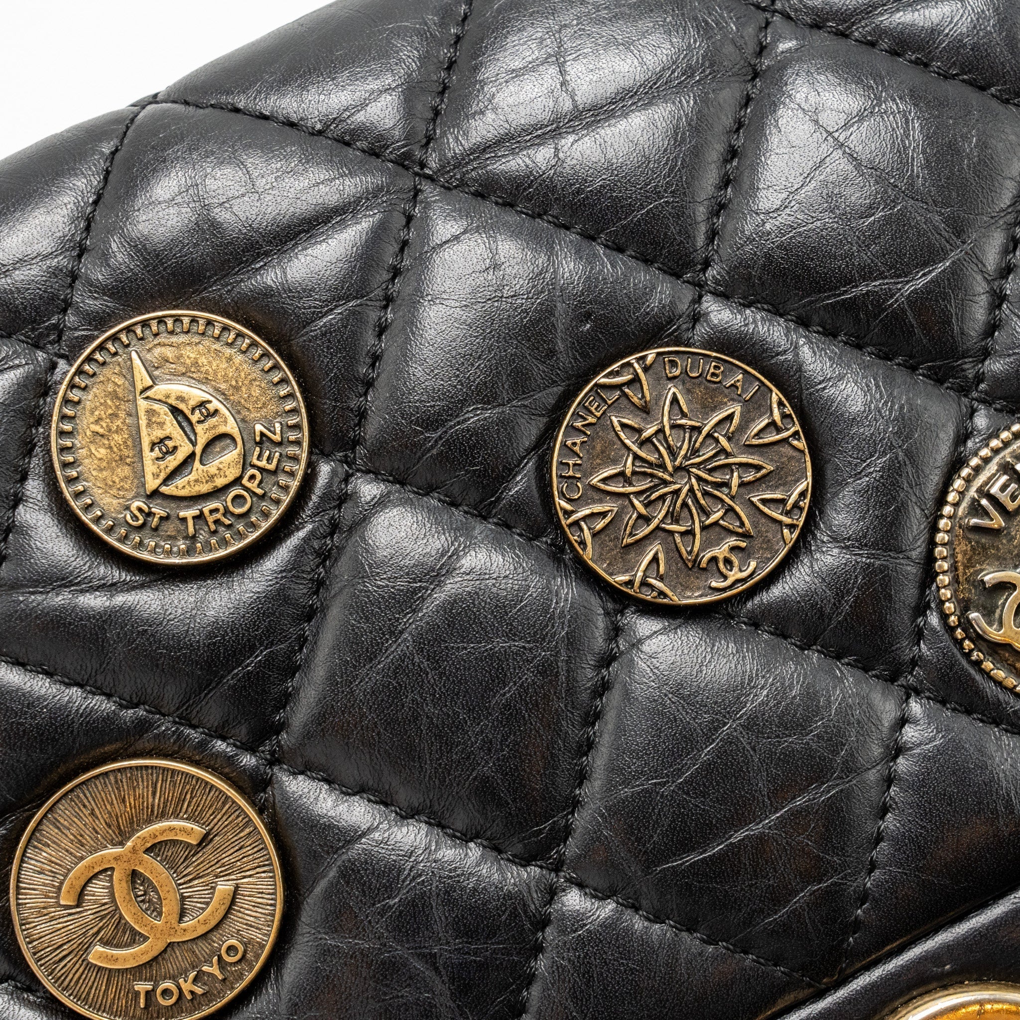 chanel-medallion-quilted-flap-bag-aged-calfskin-black-multicolour-hardware