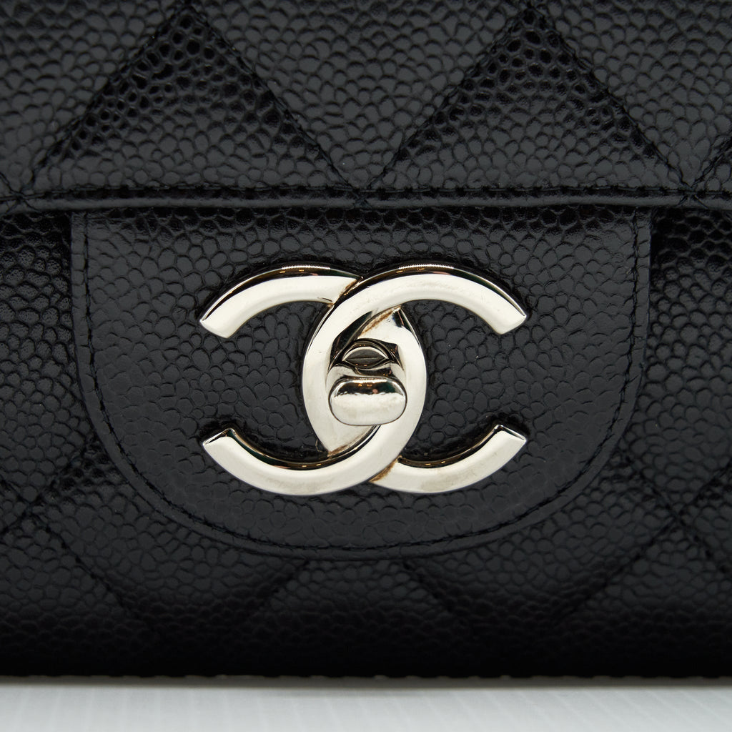 chanel-maxi-flap-bag-caviar-black-shw-1