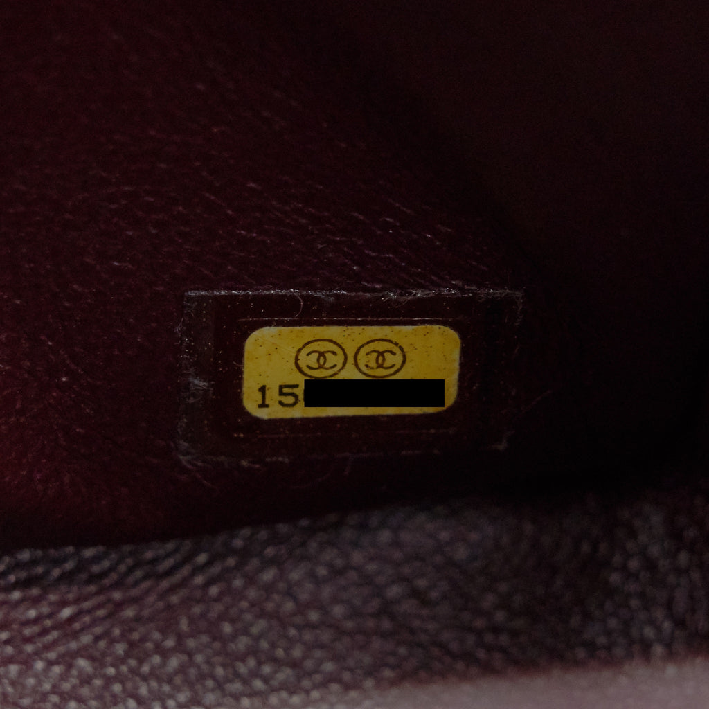 chanel-maxi-flap-bag-caviar-black-shw-1