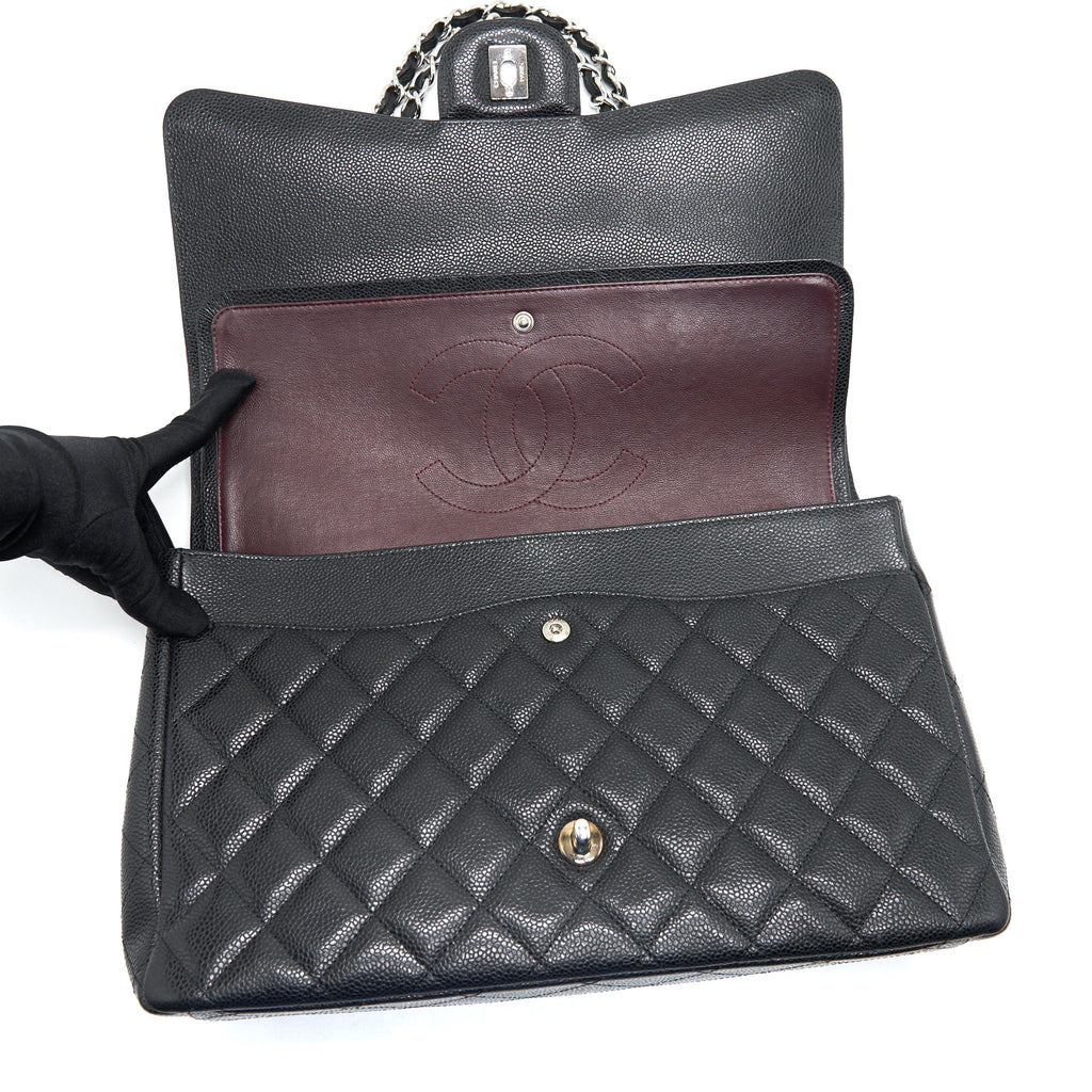 chanel-maxi-flap-bag-caviar-black-shw-1