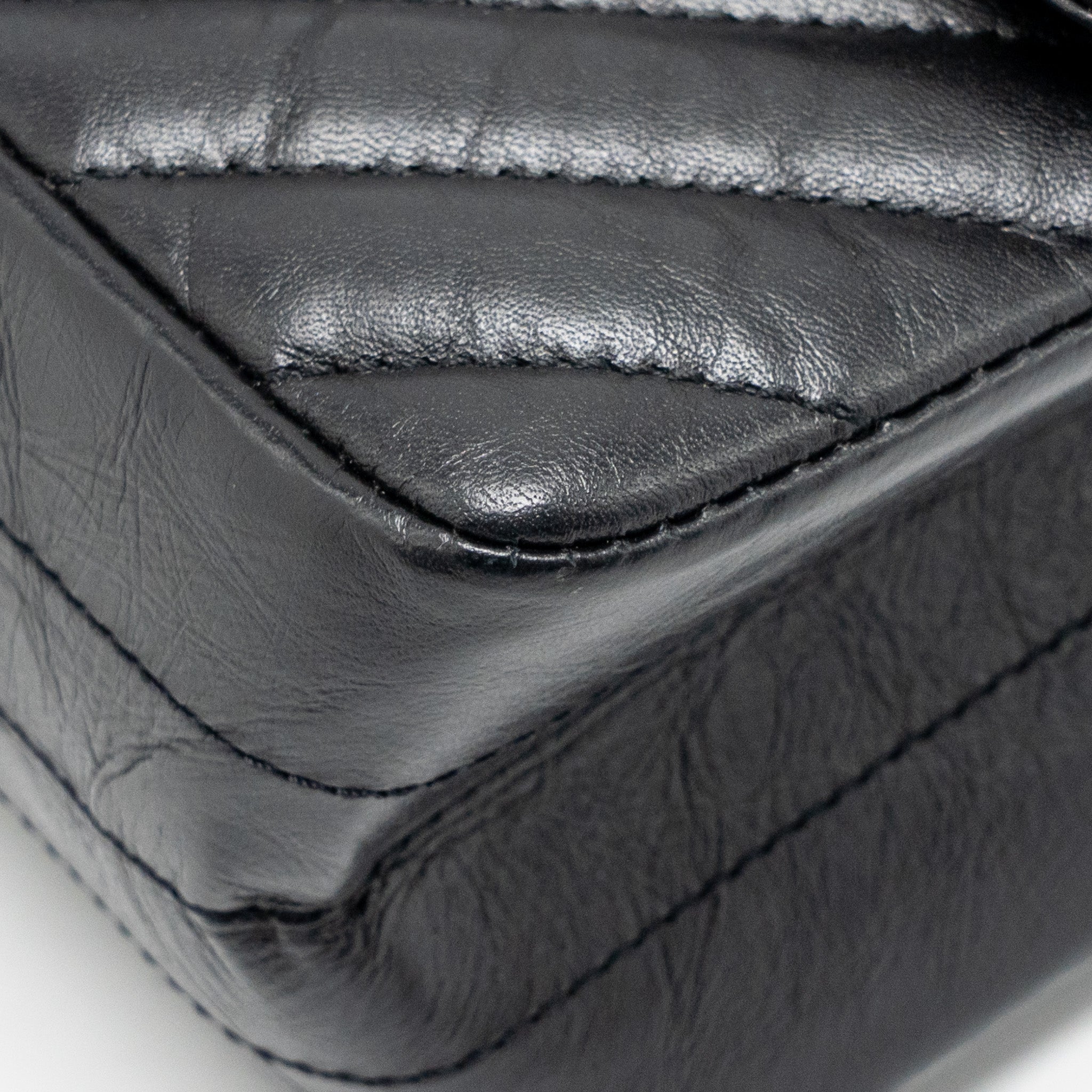 chanel-mini-2-55-reissue-flap-bag-chevron-aged-calfskin-so-black