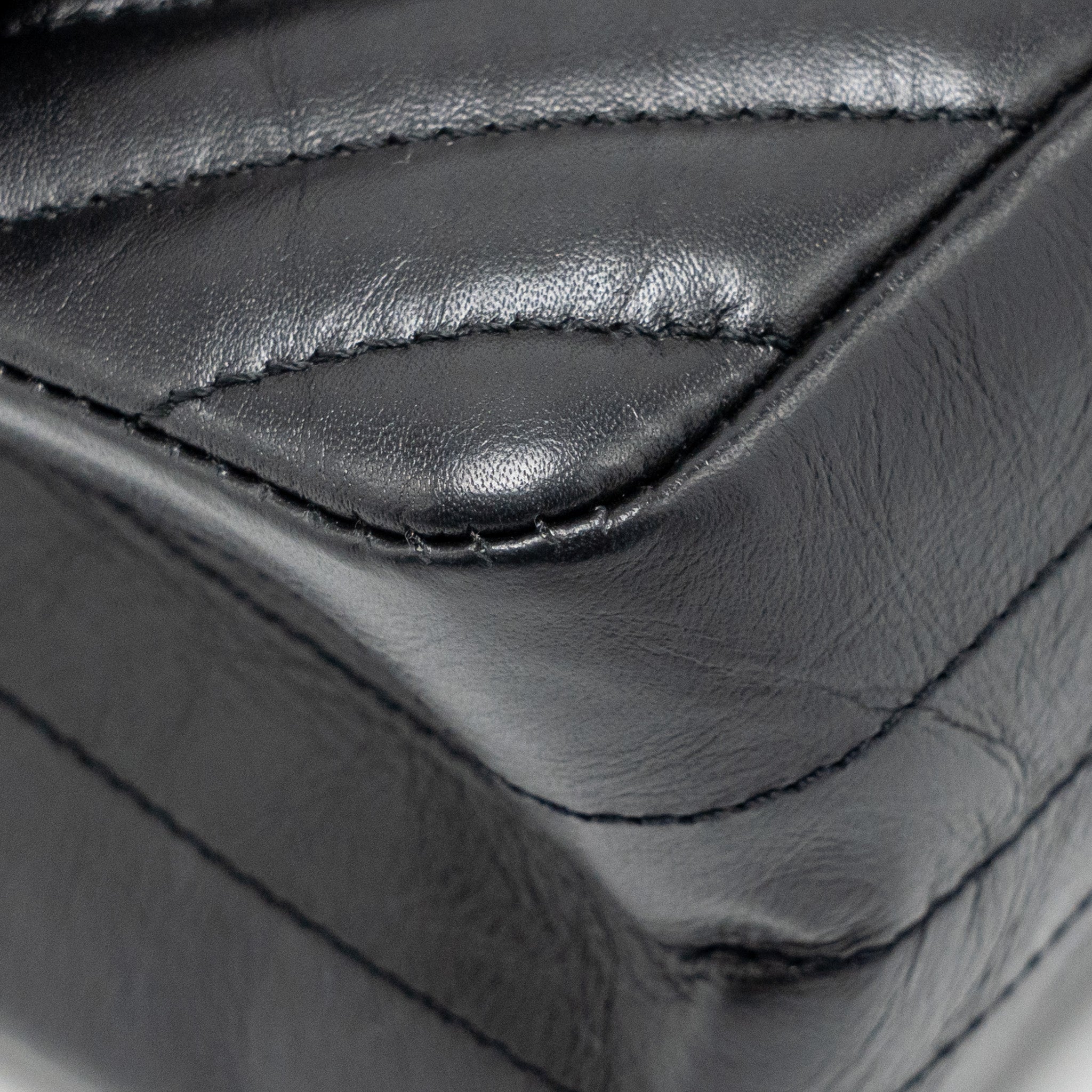 chanel-mini-2-55-reissue-flap-bag-chevron-aged-calfskin-so-black