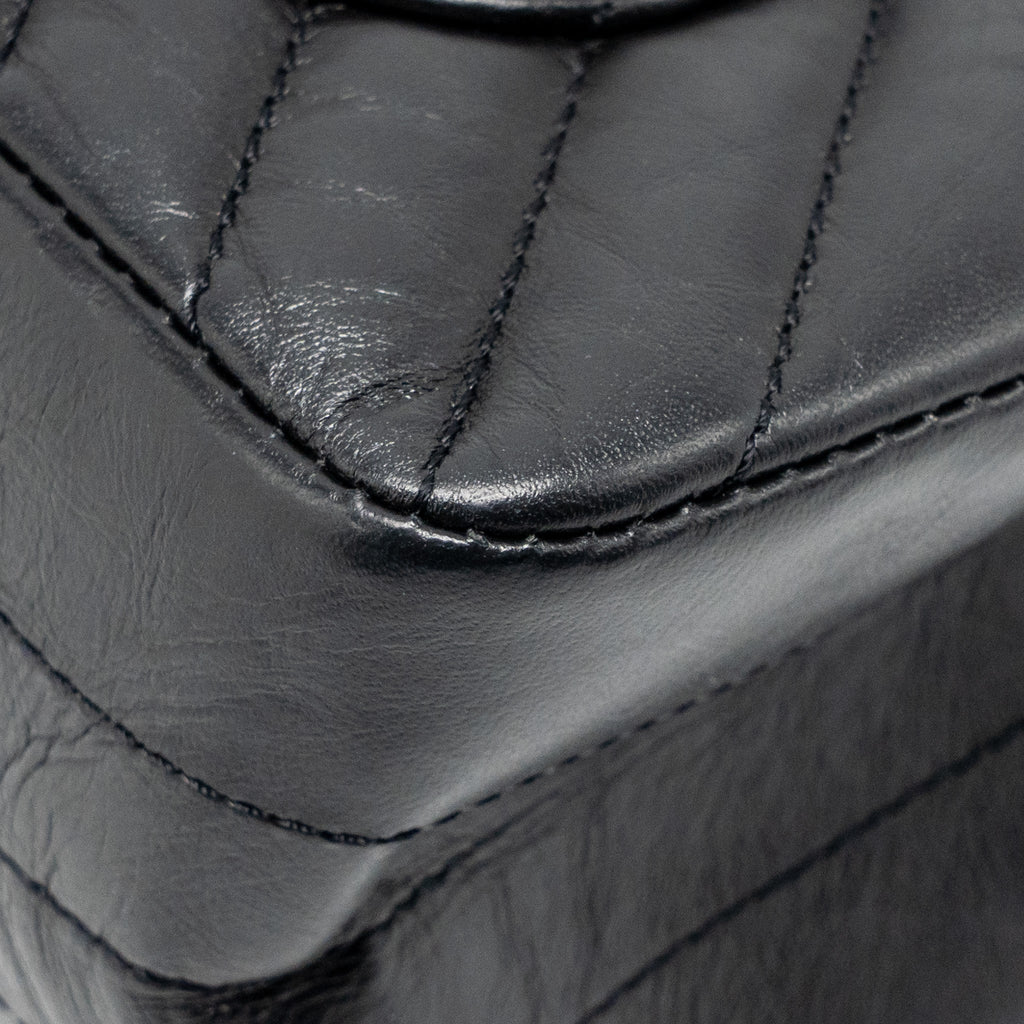 chanel-mini-2-55-reissue-flap-bag-chevron-aged-calfskin-so-black