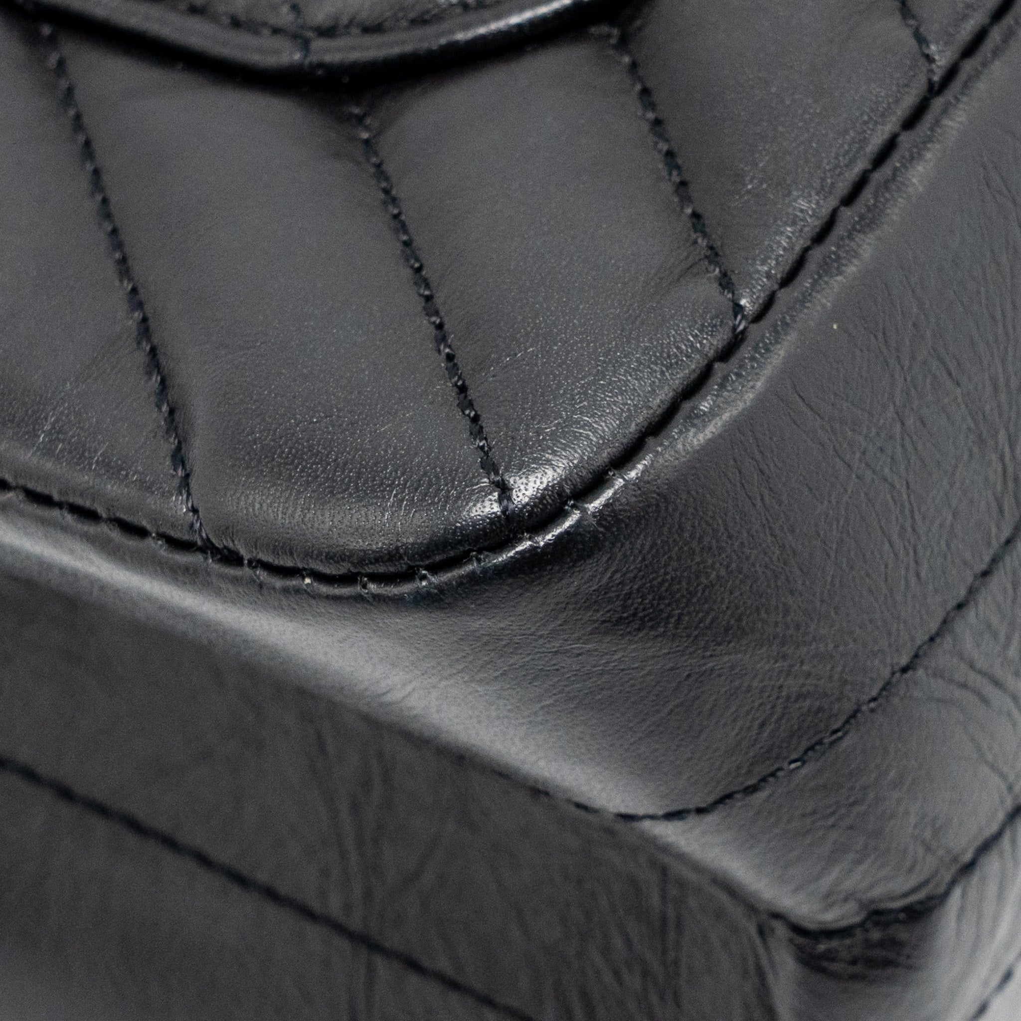 chanel-mini-2-55-reissue-flap-bag-chevron-aged-calfskin-so-black