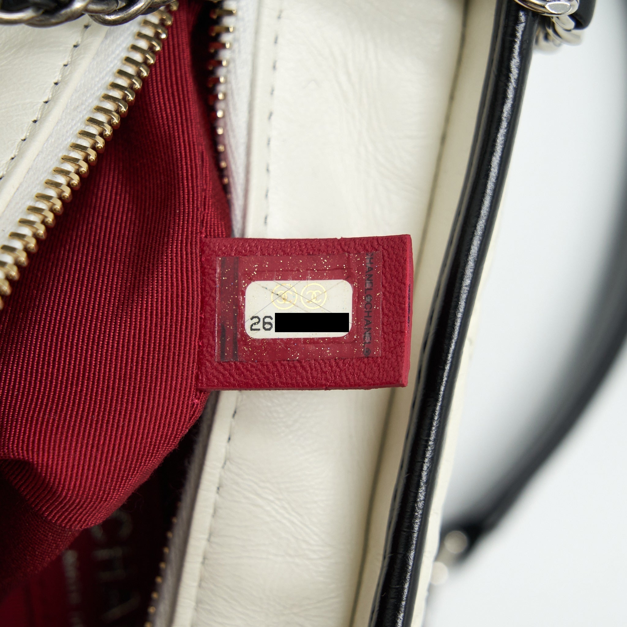 chanel-small-gabrielle-hobo-bag-calfskin-white-black-with-multicolour-hardware