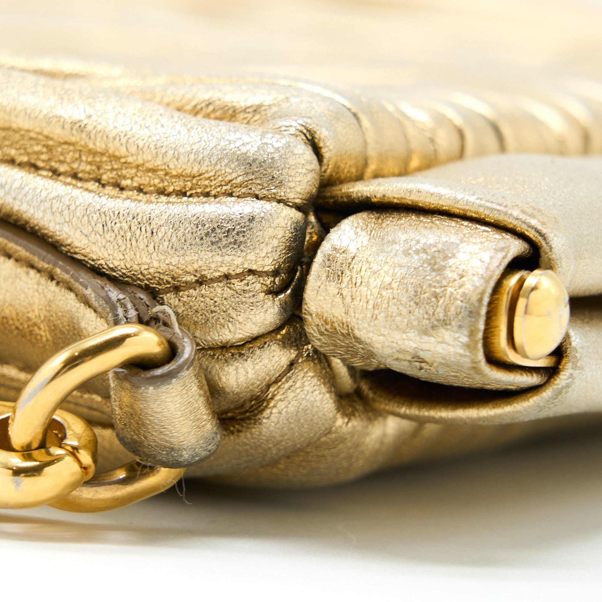 miu-miu-matelasse-crossbody-bag-gold-ghw