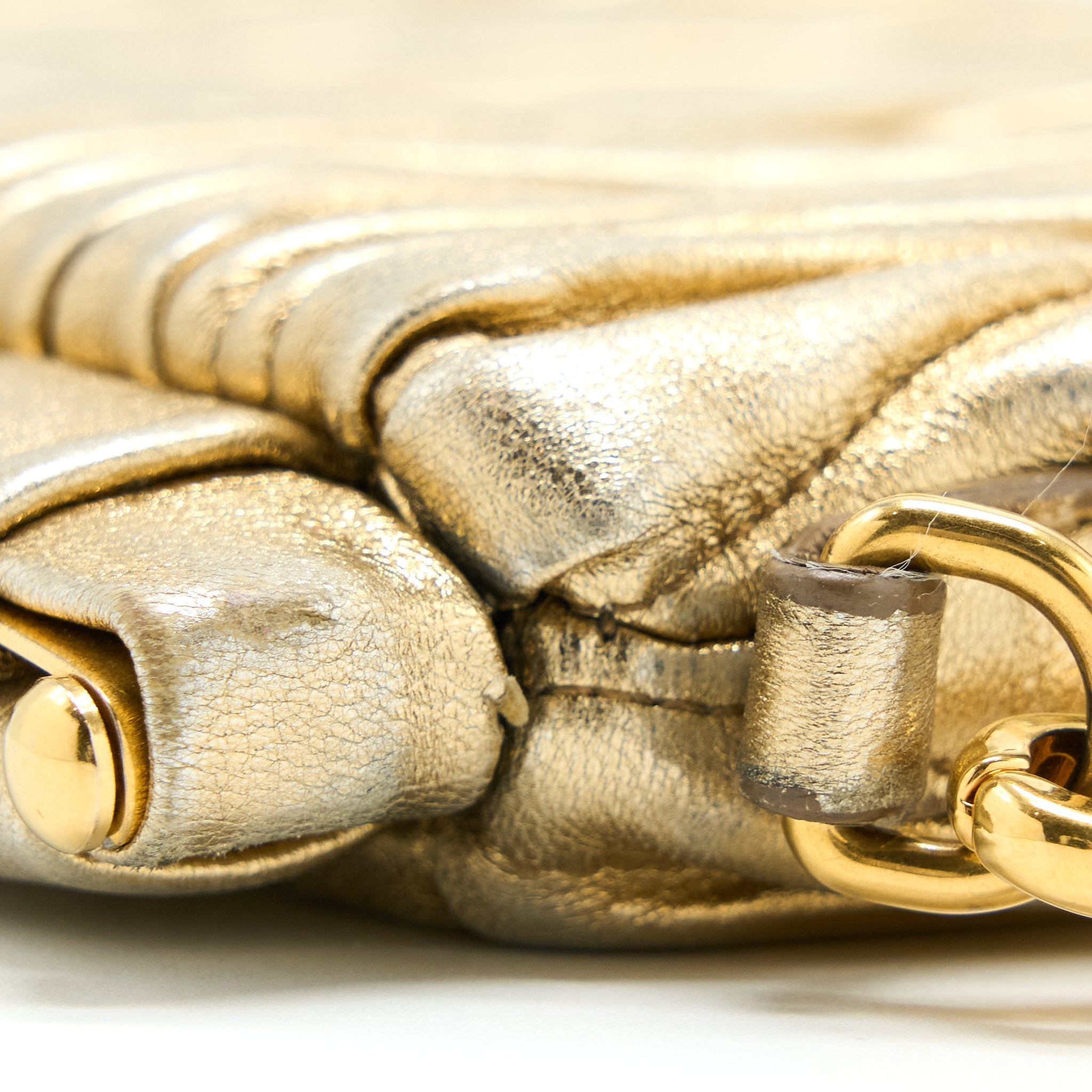 miu-miu-matelasse-crossbody-bag-gold-ghw