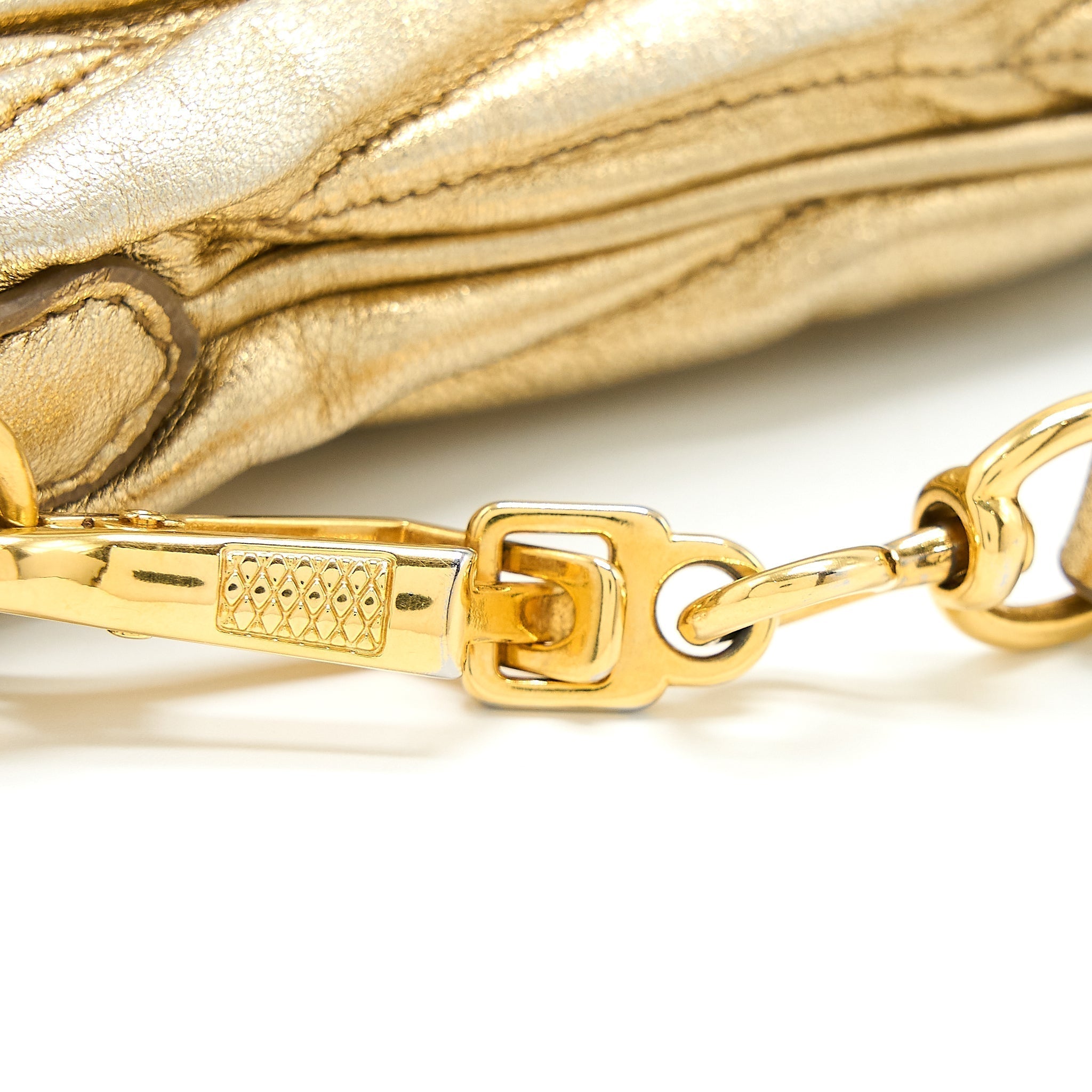 miu-miu-matelasse-crossbody-bag-gold-ghw