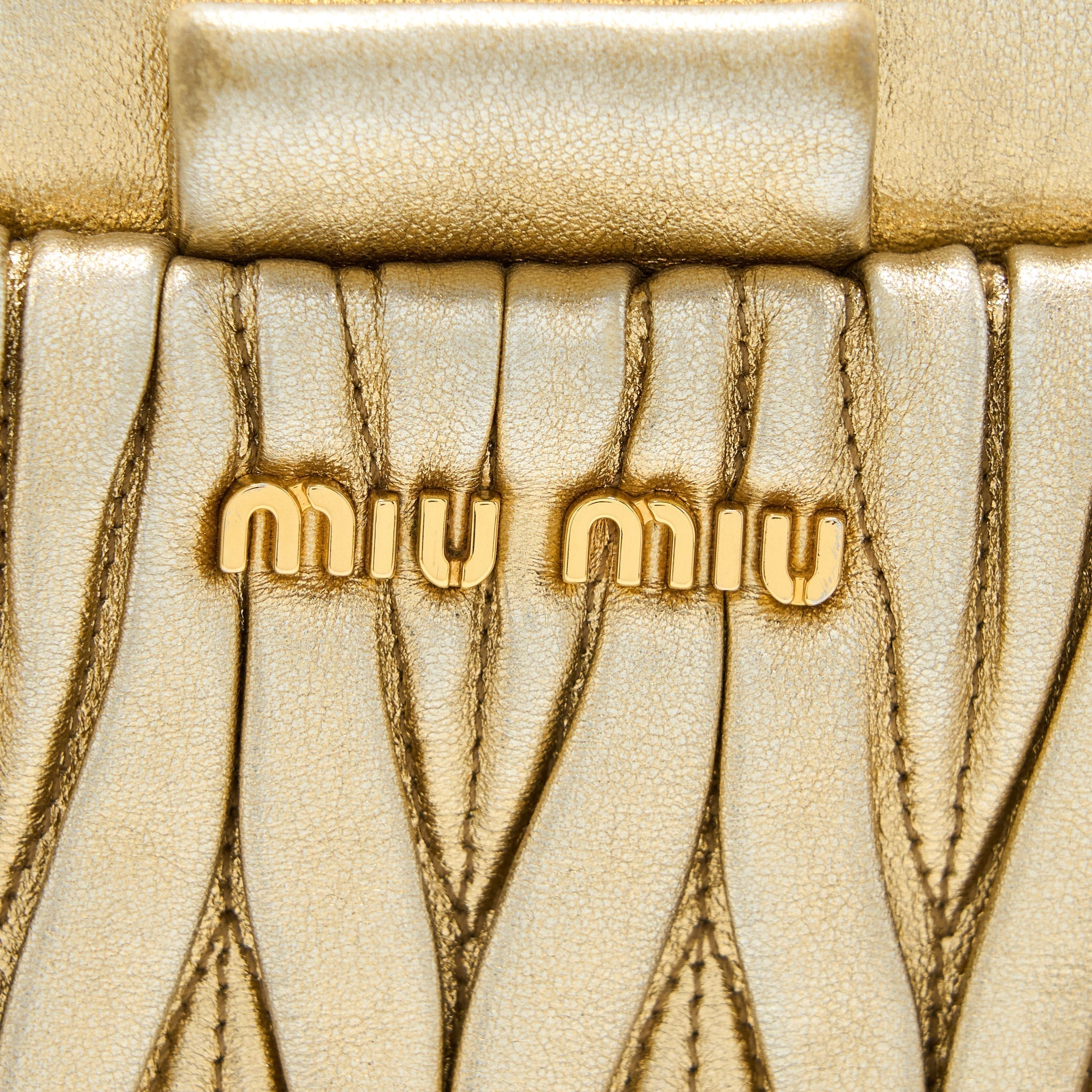 miu-miu-matelasse-crossbody-bag-gold-ghw