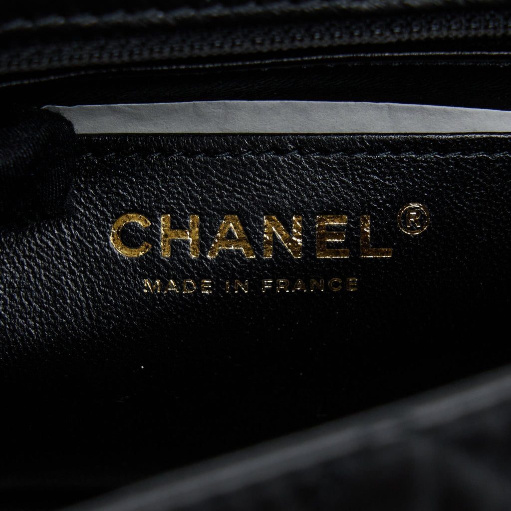chanel-mini-2-55-reissue-flap-bag-aged-calfskin-black-ghw-microchip