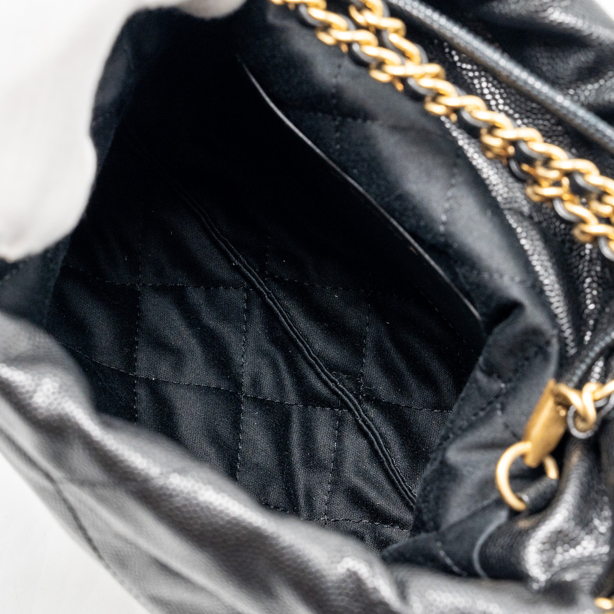 chanel-mini-22-bag-caviar-black-ghw-microchip-1