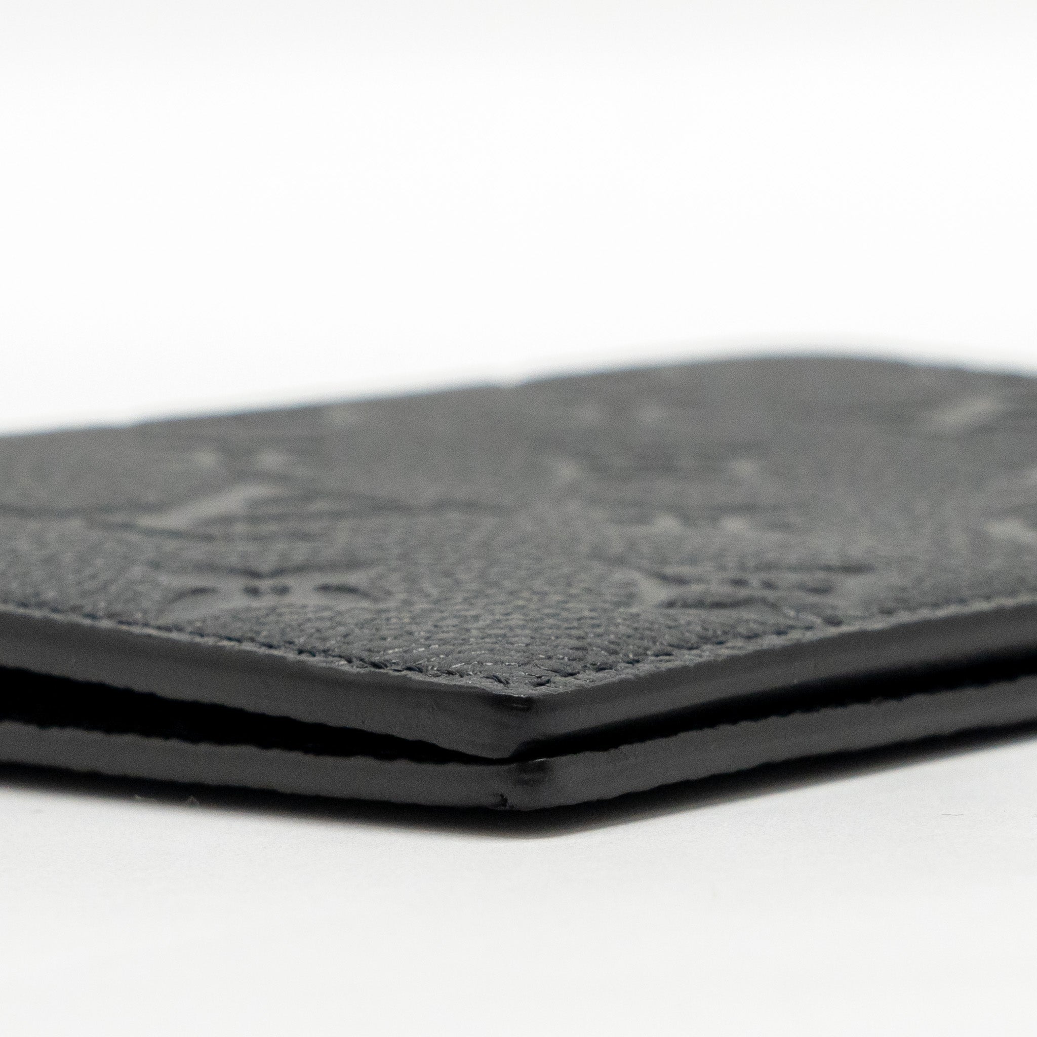 louis-vuitton-passport-cover-monogram-empreinte-leather-black