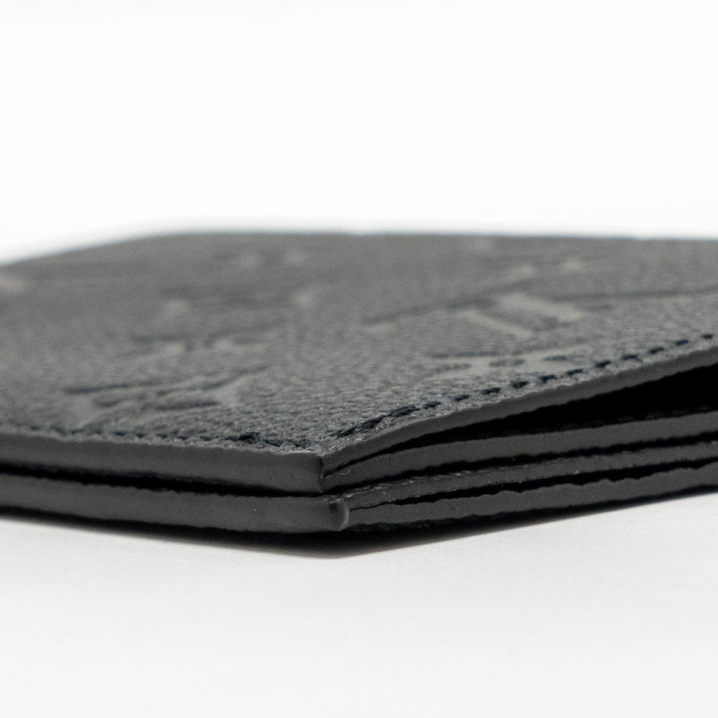 louis-vuitton-passport-cover-monogram-empreinte-leather-black