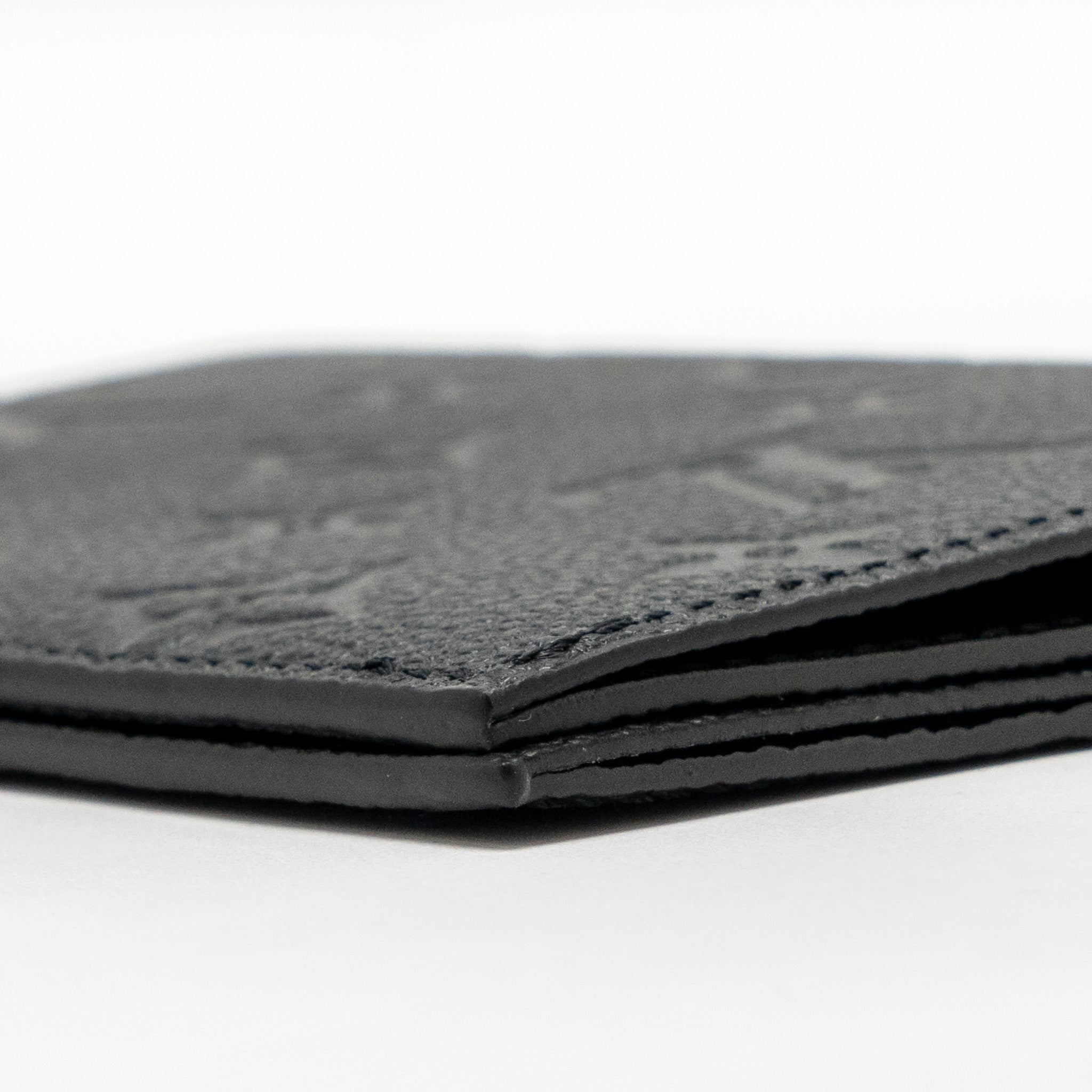 louis-vuitton-passport-cover-monogram-empreinte-leather-black