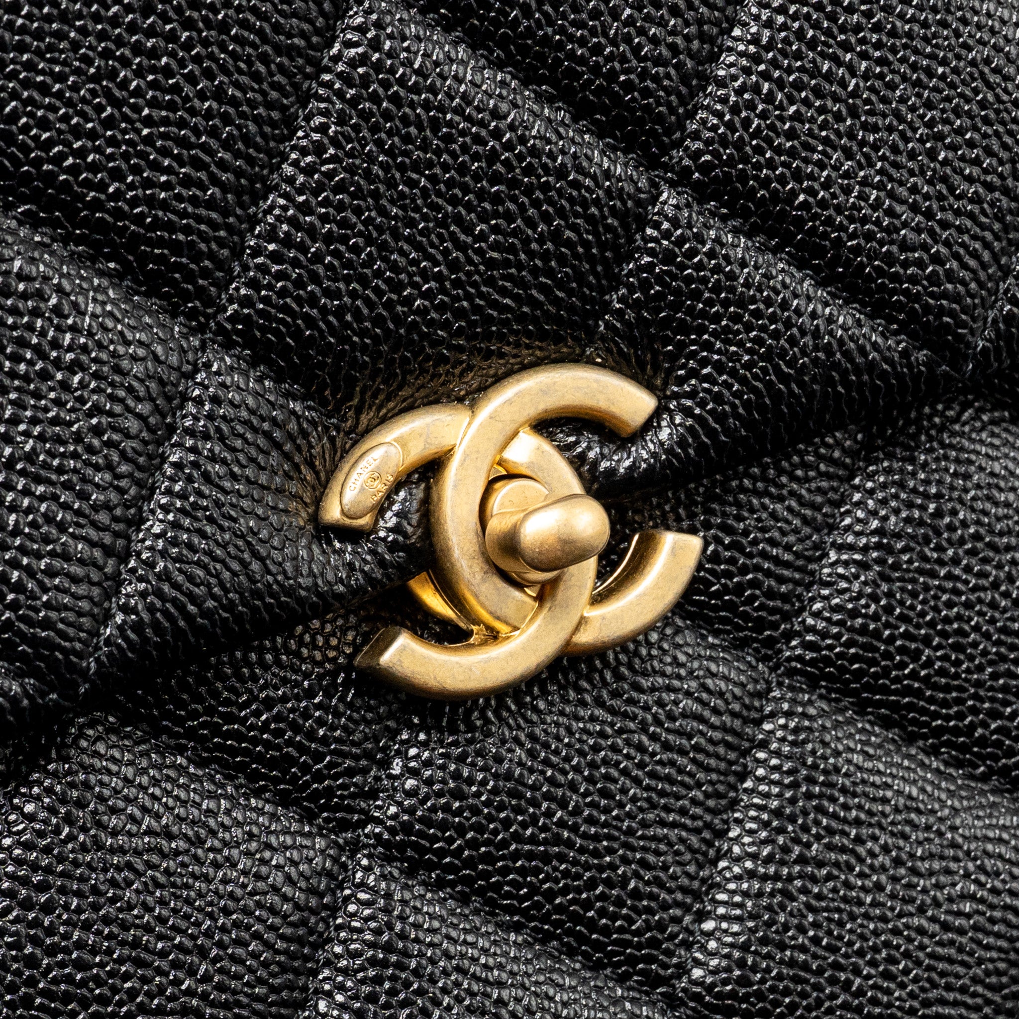 chanel-quilted-flap-backpack-caviar-black-ghw-microchip-1