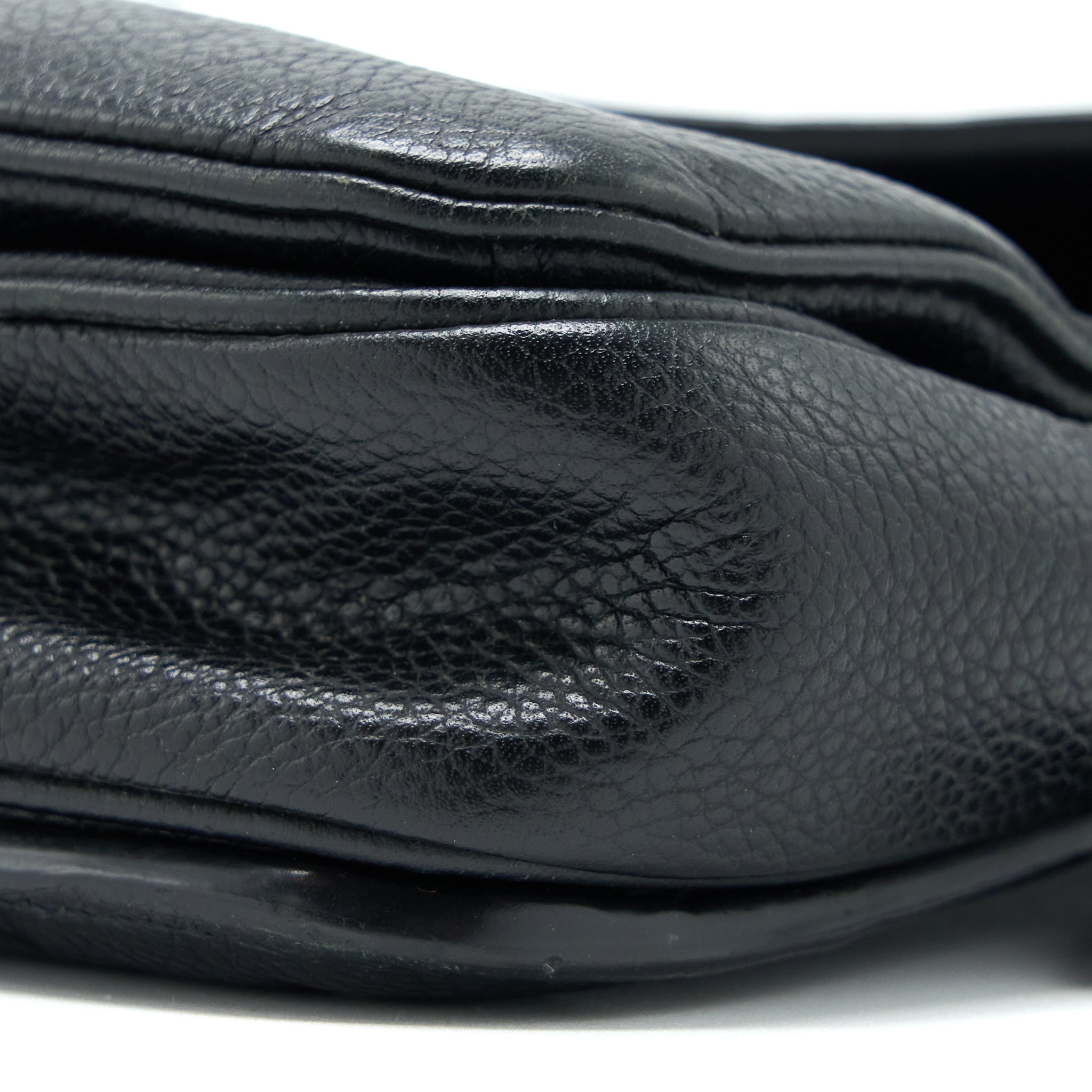louis-vuitton-pochette-metis-monogram-empreinte-black-ghw-4