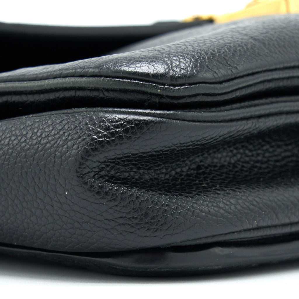 louis-vuitton-pochette-metis-monogram-empreinte-black-ghw-4