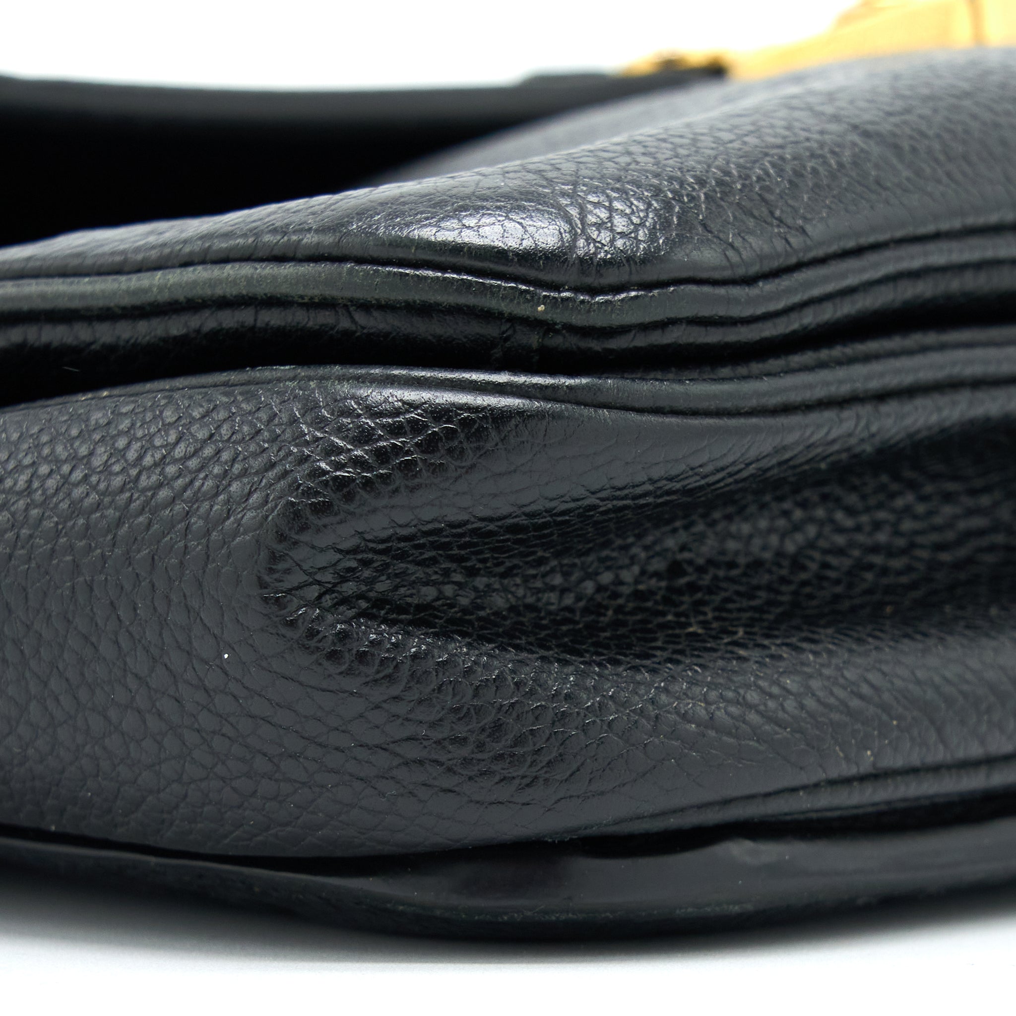 louis-vuitton-pochette-metis-monogram-empreinte-black-ghw-4