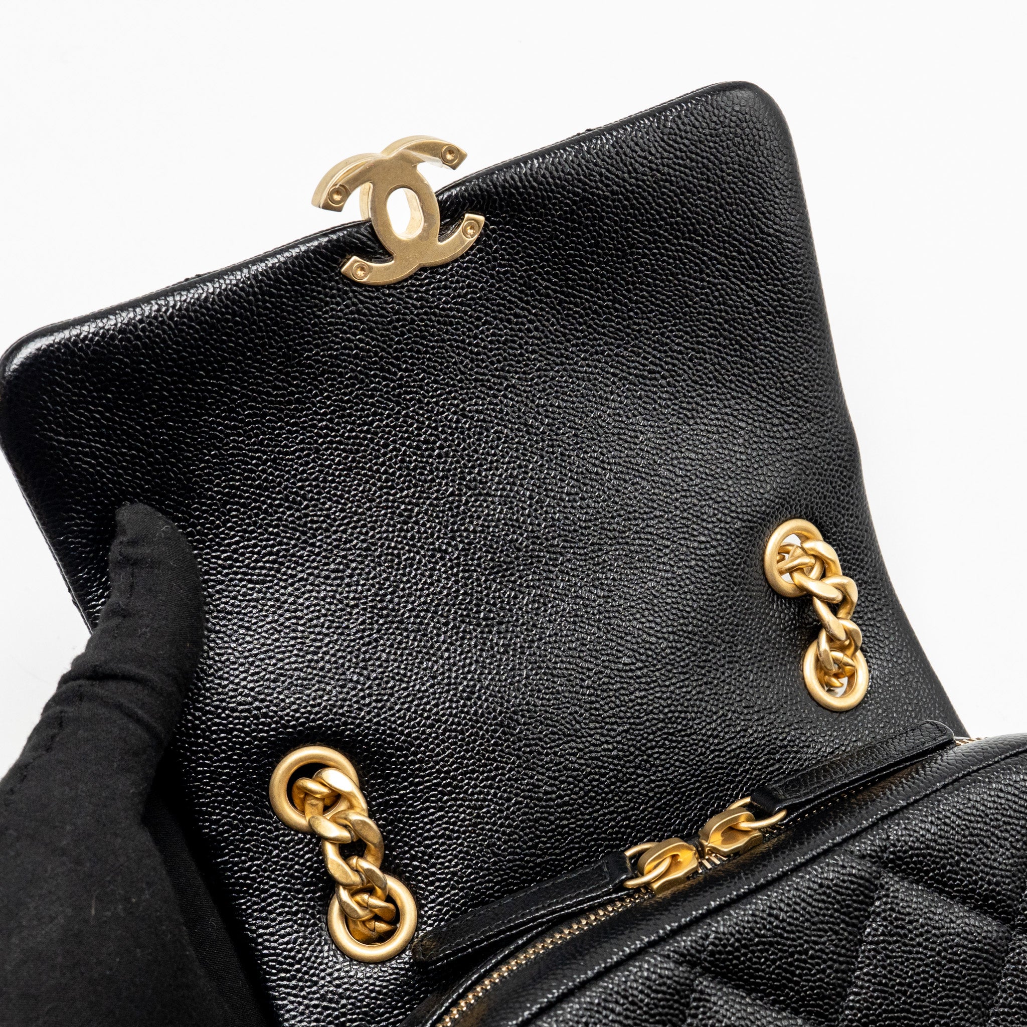 chanel-quilted-flap-backpack-caviar-black-ghw-microchip-1