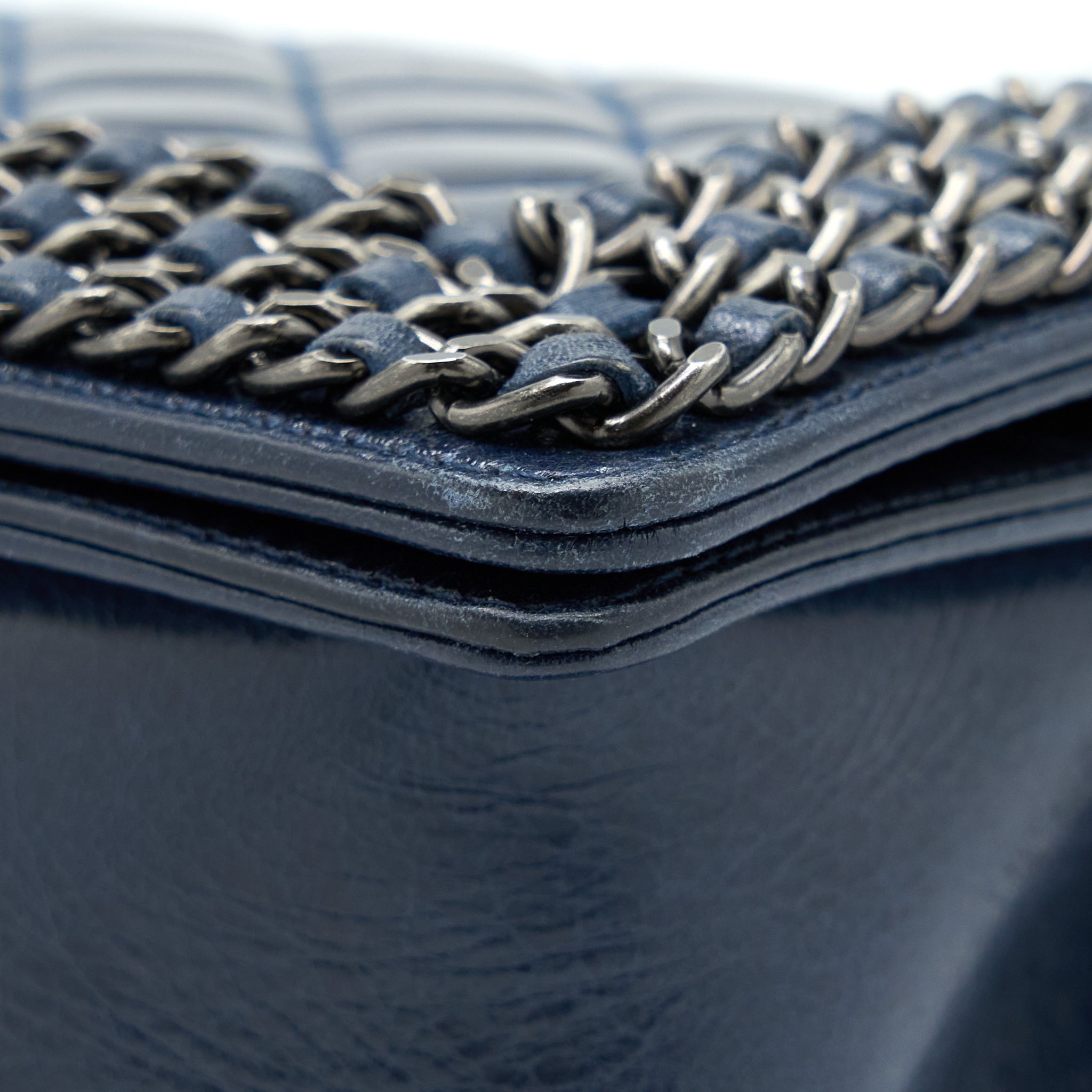 chanel-medium-boy-bag-limited-edition-with-chain-edge-aged-calfskin-navy-ruthenium-hardware