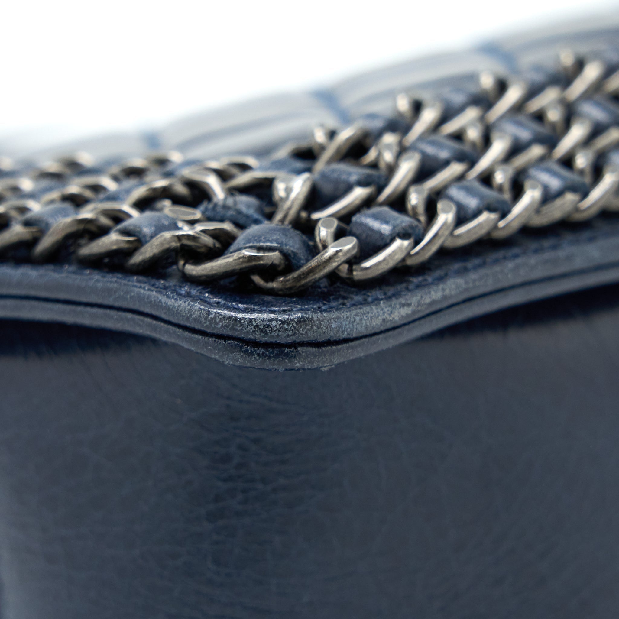 chanel-medium-boy-bag-limited-edition-with-chain-edge-aged-calfskin-navy-ruthenium-hardware
