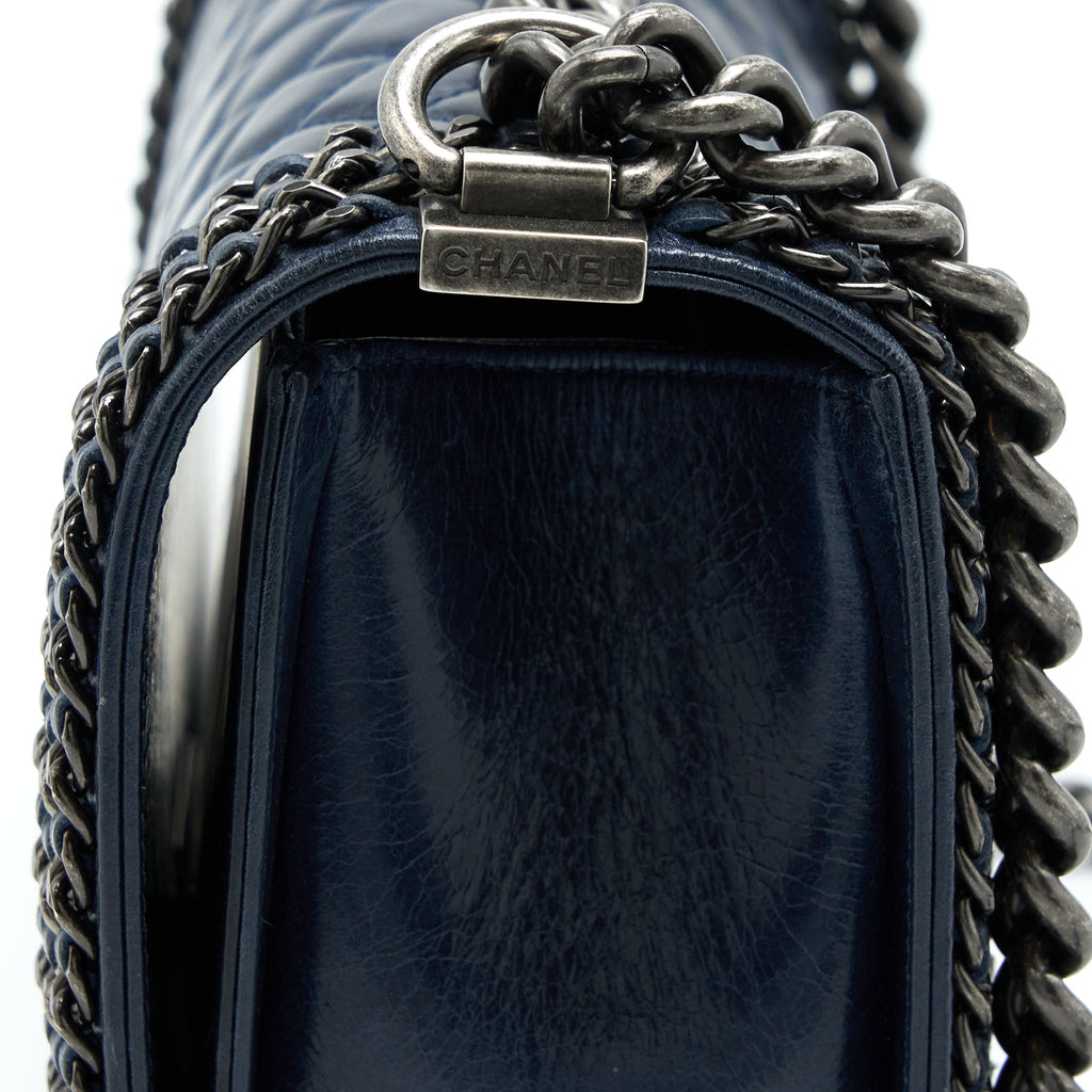 chanel-medium-boy-bag-limited-edition-with-chain-edge-aged-calfskin-navy-ruthenium-hardware
