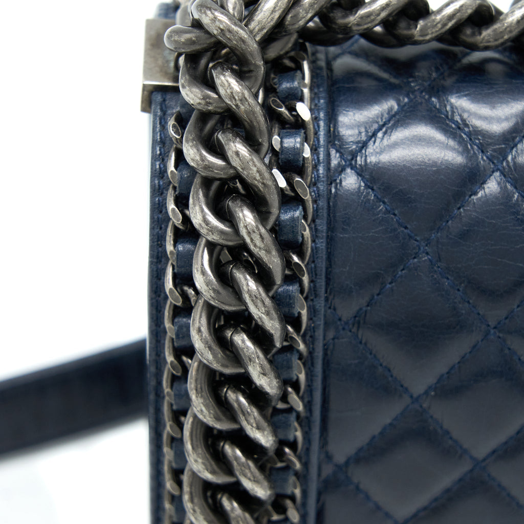 chanel-medium-boy-bag-limited-edition-with-chain-edge-aged-calfskin-navy-ruthenium-hardware