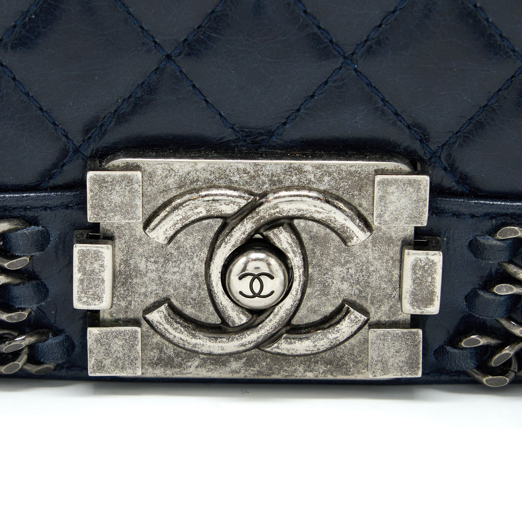 chanel-medium-boy-bag-limited-edition-with-chain-edge-aged-calfskin-navy-ruthenium-hardware