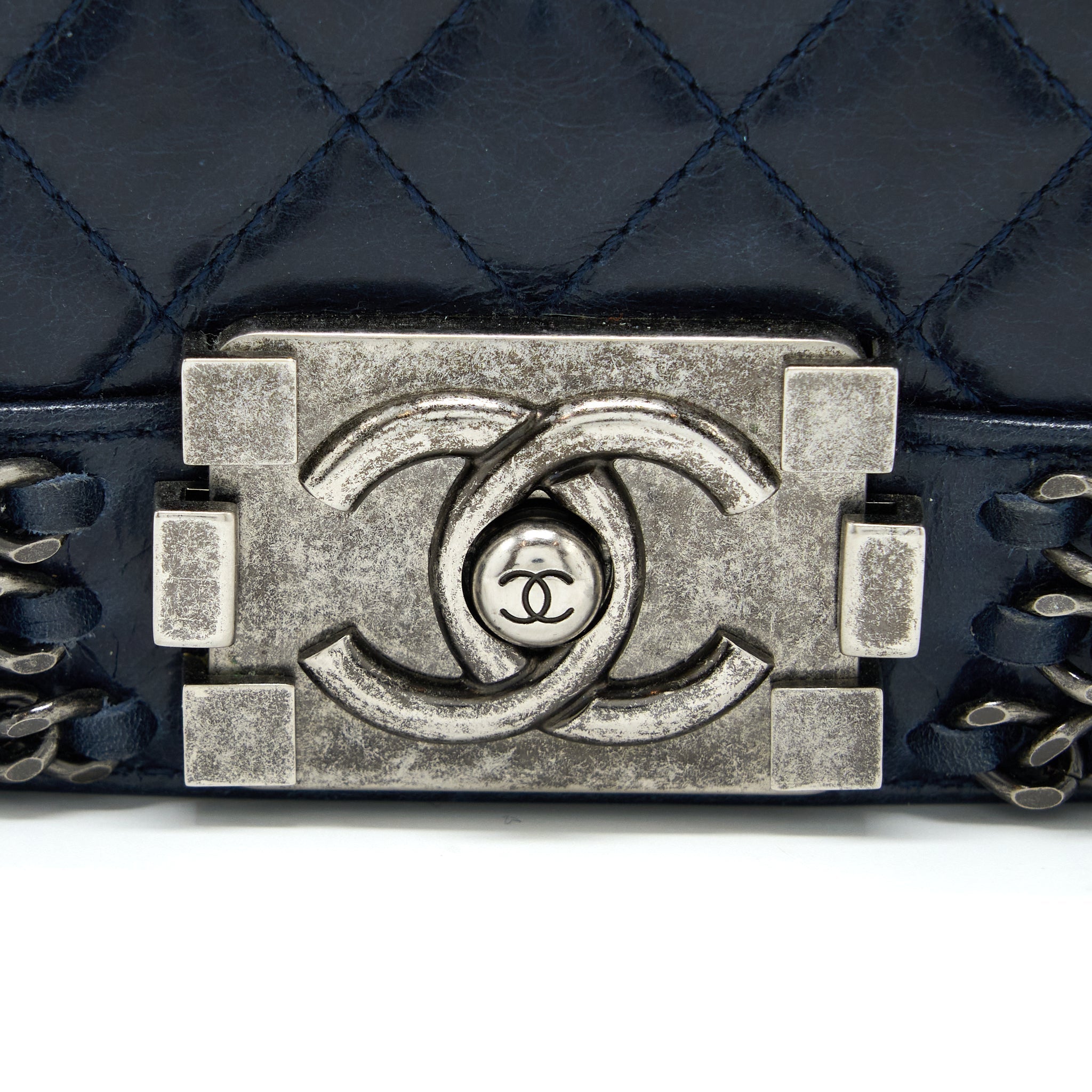 chanel-medium-boy-bag-limited-edition-with-chain-edge-aged-calfskin-navy-ruthenium-hardware