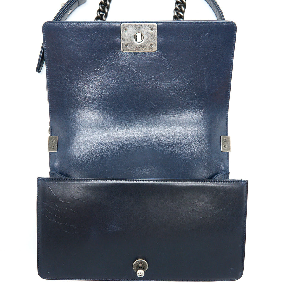 chanel-medium-boy-bag-limited-edition-with-chain-edge-aged-calfskin-navy-ruthenium-hardware