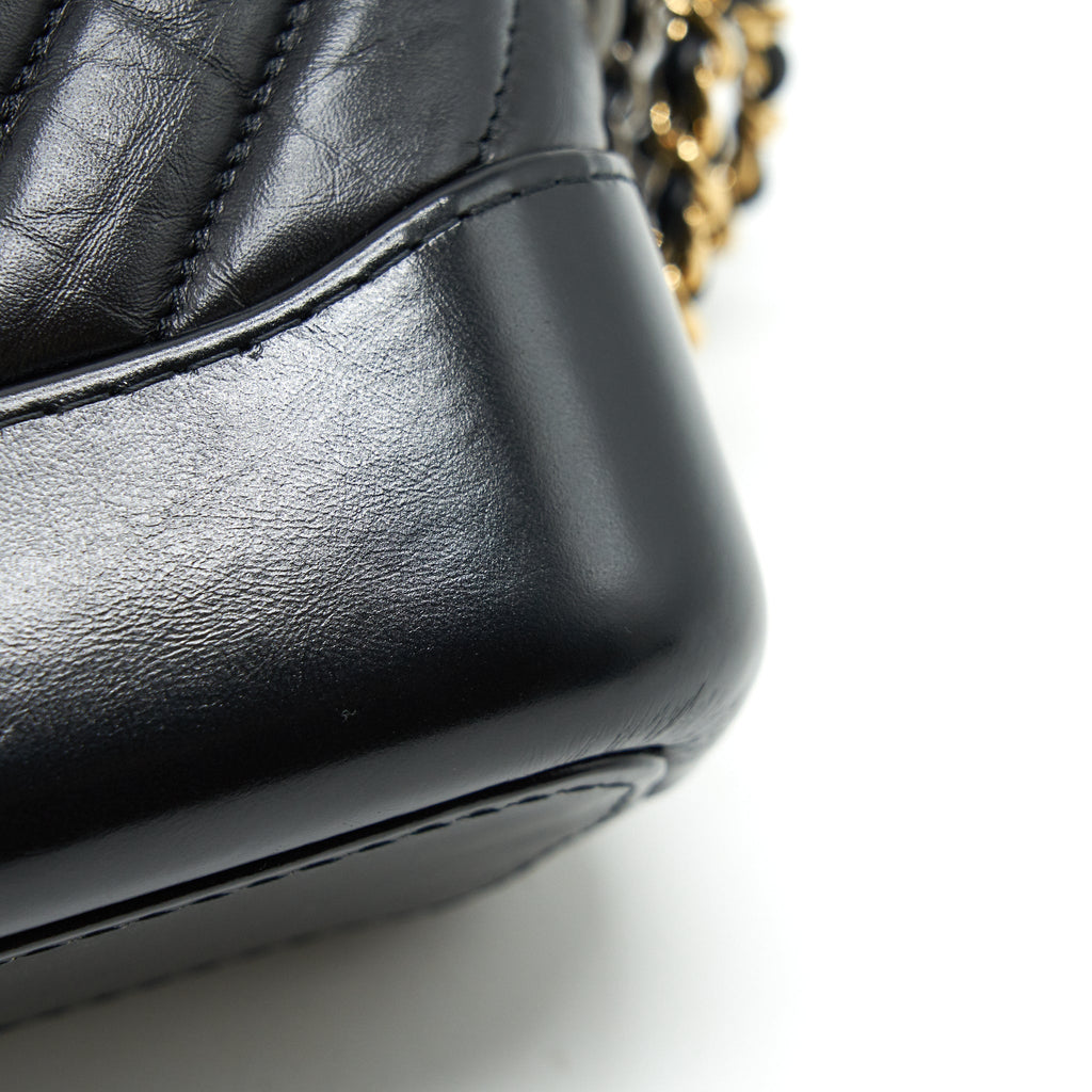 chanel-chevron-gabrielle-hobo-bag-black-with-gold-and-silver-hardware