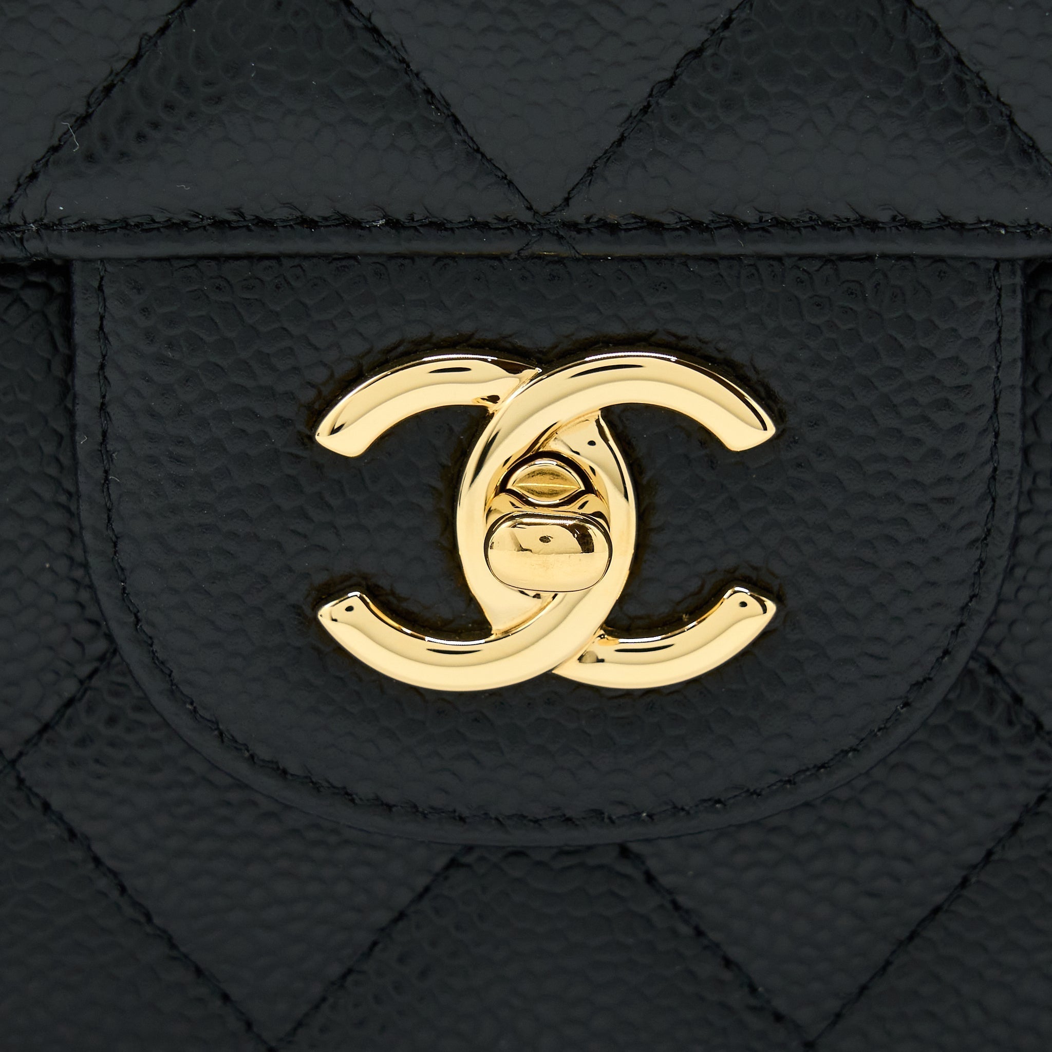 chanel-classic-jumbo-flap-bag-caviar-black-ghw