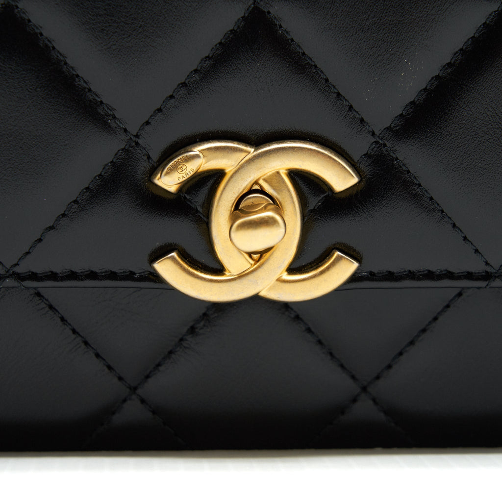 chanel-21a-gold-crush-flap-bag-calfskin-black-ghw