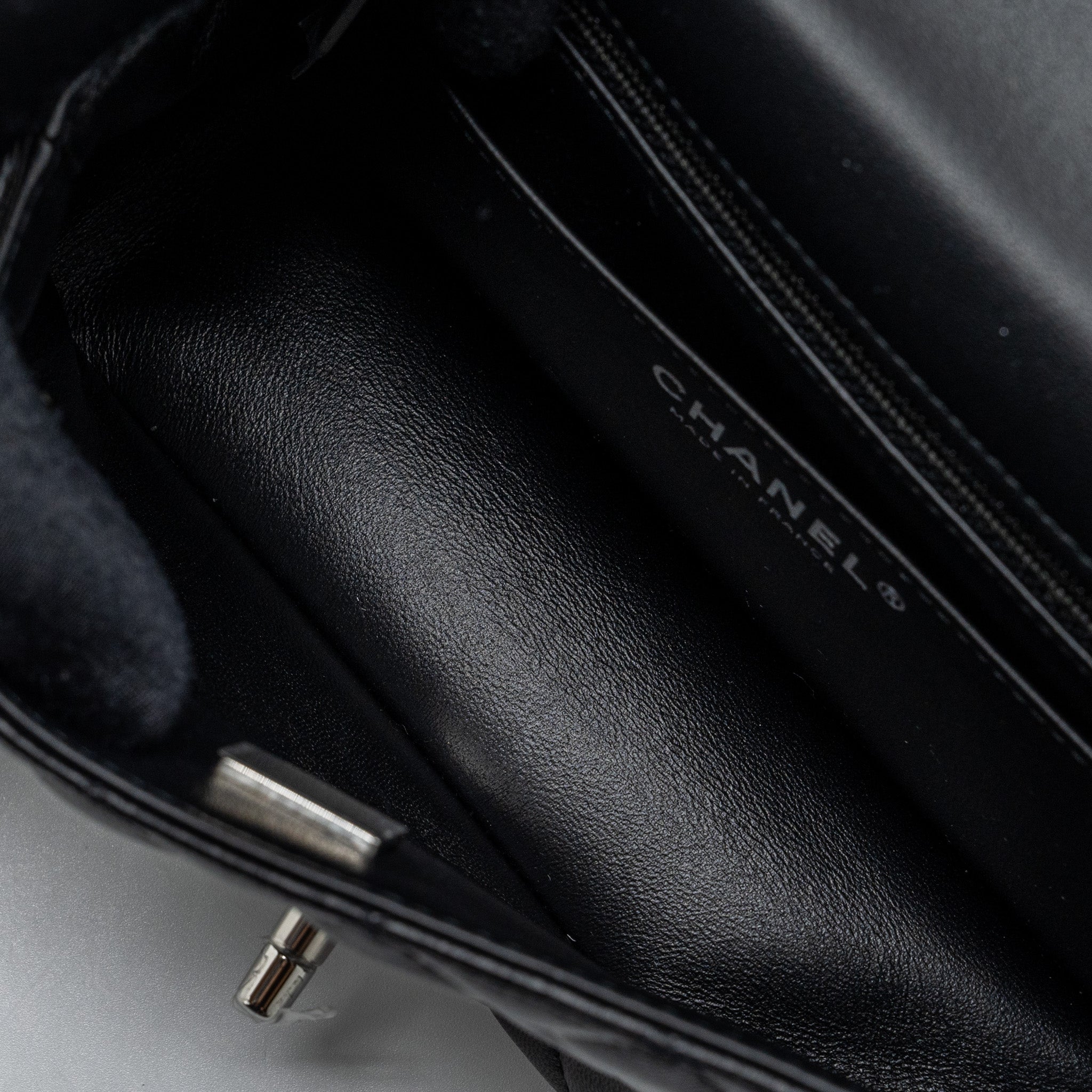 chanel-mini-rectangular-flap-bag-lambskin-black-shw-microchip-1