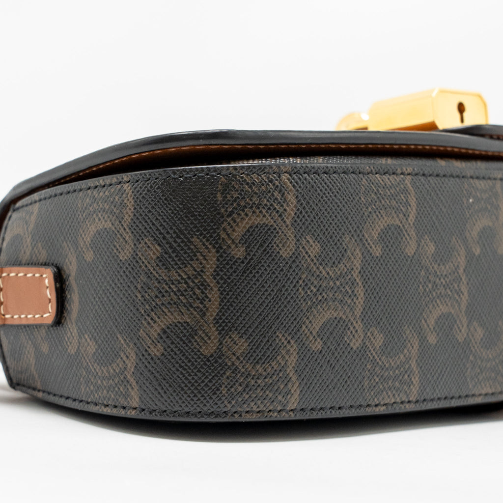 celine-clutch-on-strap-tabou-triomphe-canvas-calfskin-tan-ghw-1