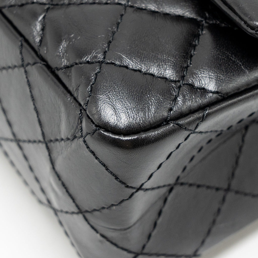 chanel-small-2-55-reissue-flap-bag-aged-calfskin-black-ghw-3