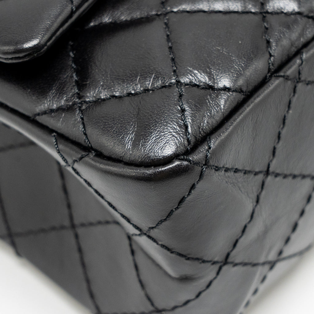 chanel-small-2-55-reissue-flap-bag-aged-calfskin-black-ghw-3