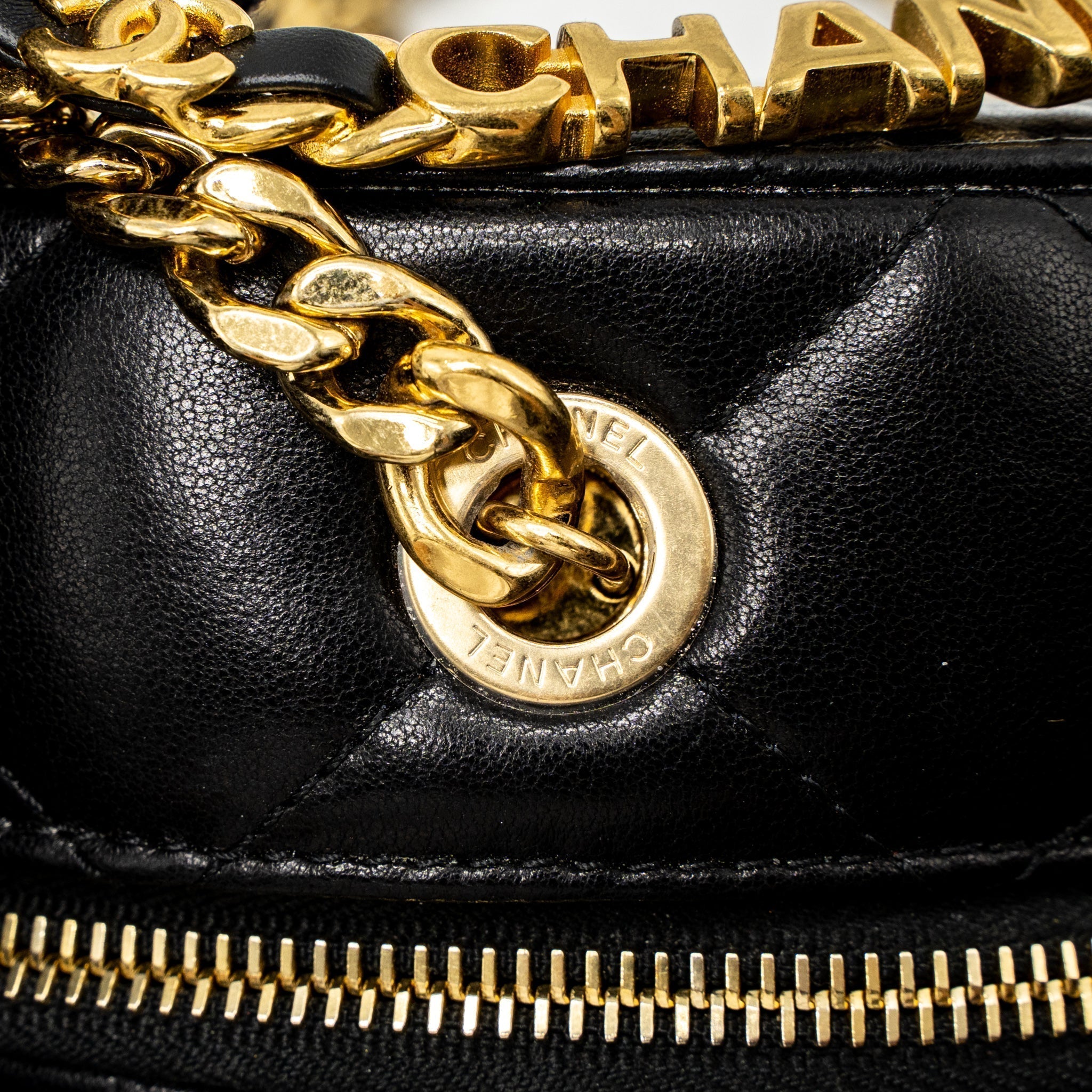 chanel-round-vanity-with-round-handle-crossbody-bag-lambskin-black-ghw-microchip