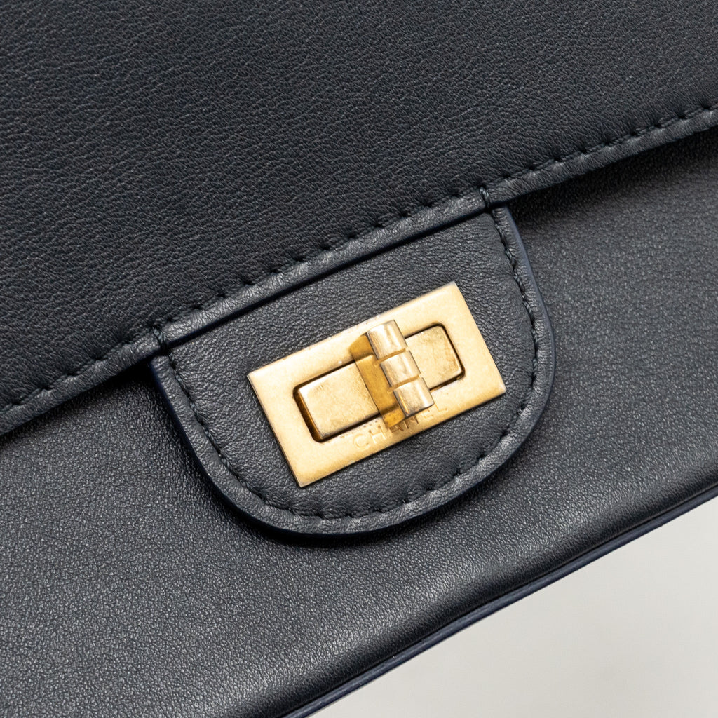 chanel-detailed-charms-limited-edition-2-55-reissue-bag-calfskin-dark-navy-ghw-copy