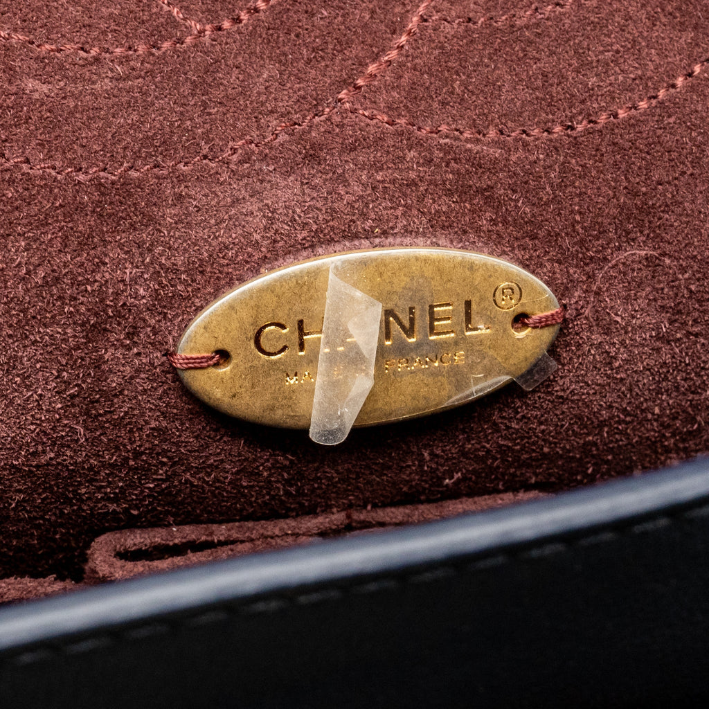 chanel-detailed-charms-limited-edition-2-55-reissue-bag-calfskin-dark-navy-ghw-copy