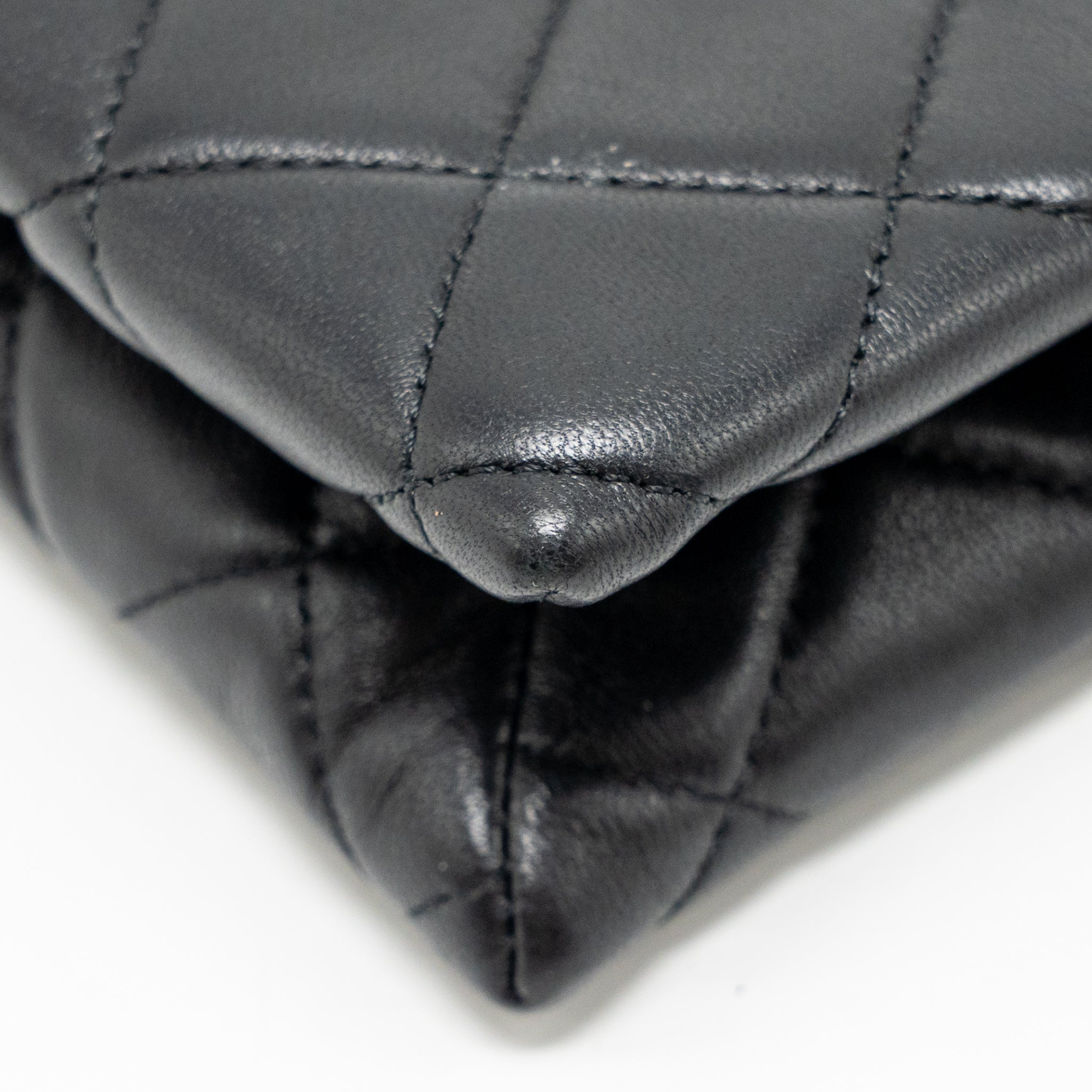 chanel-coco-charms-chain-quilted-pouch-bag-lambskin-black-lghw
