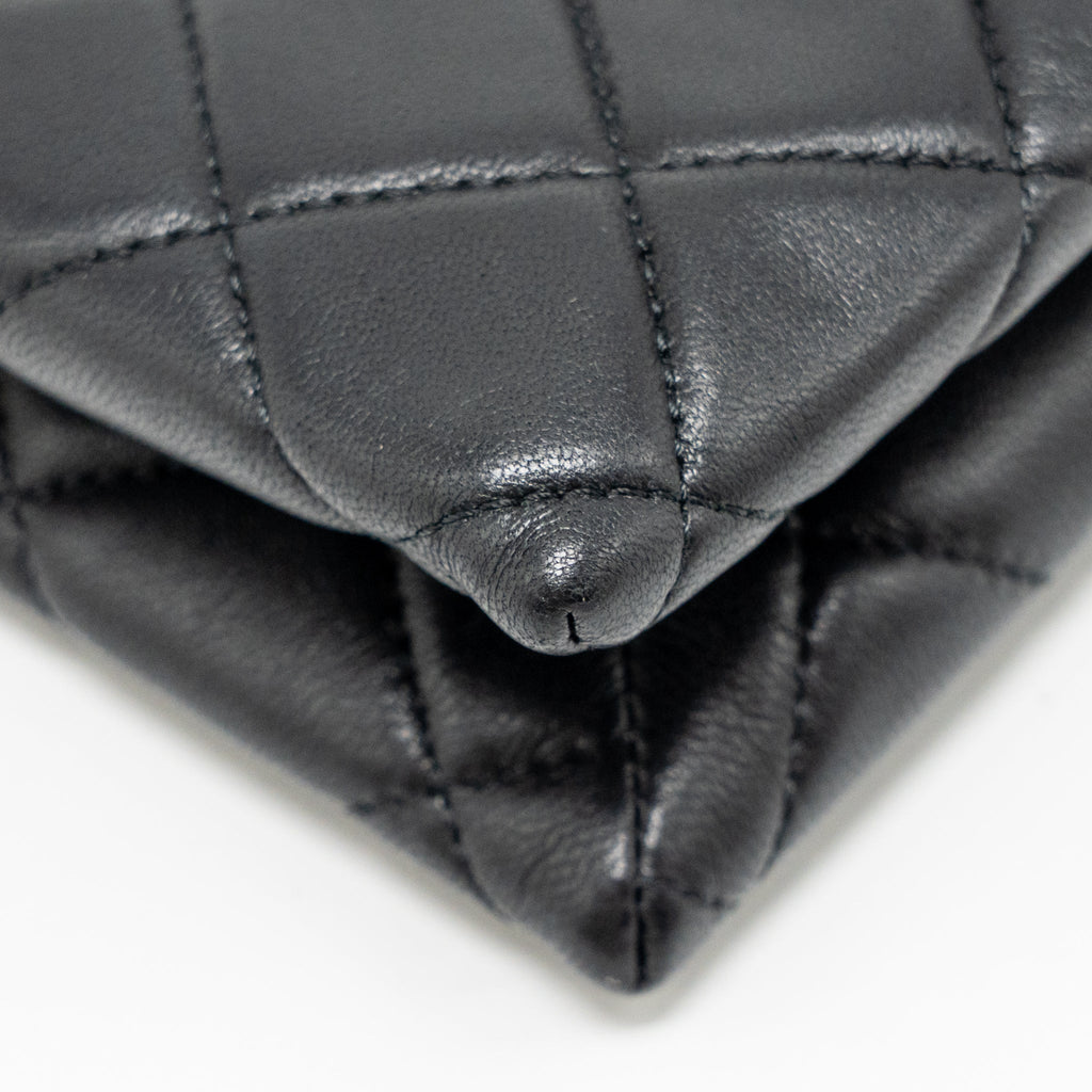 chanel-coco-charms-chain-quilted-pouch-bag-lambskin-black-lghw