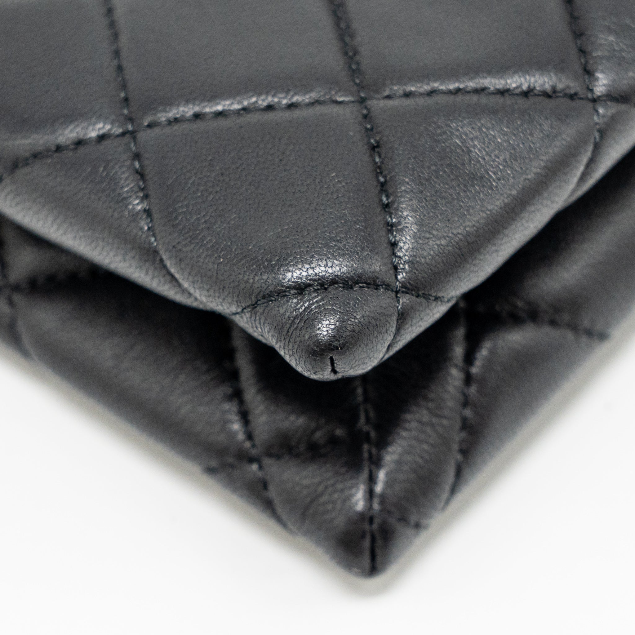chanel-coco-charms-chain-quilted-pouch-bag-lambskin-black-lghw