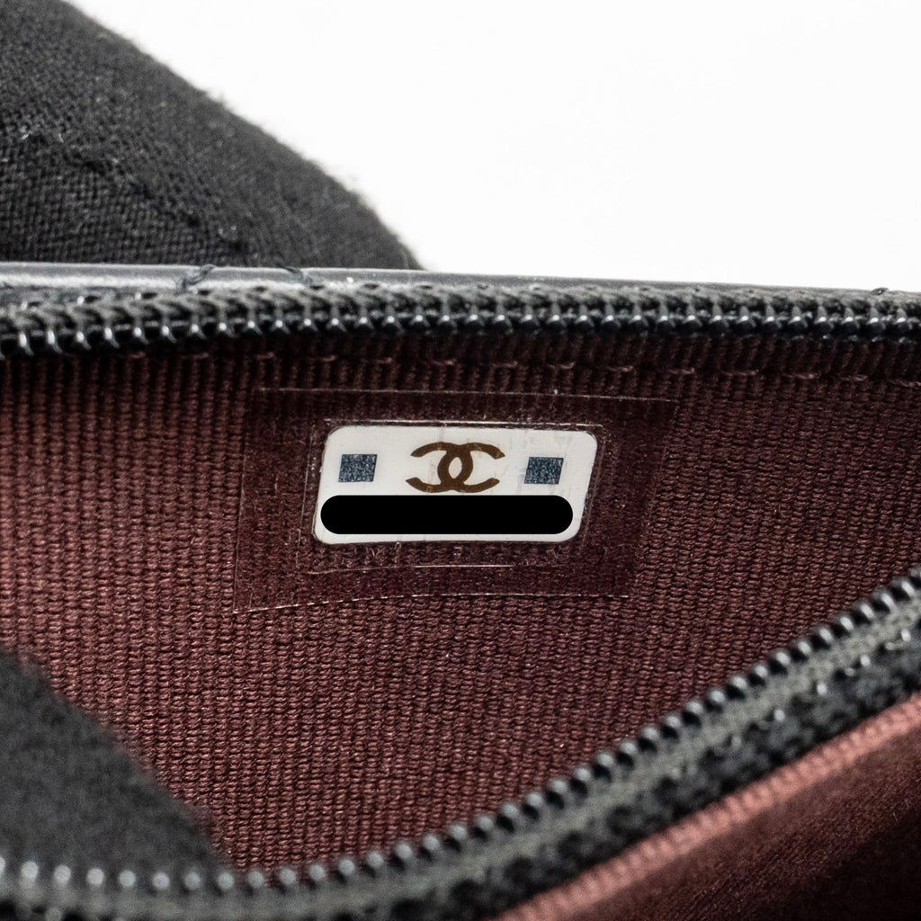 chanel-mini-2-55-reissue-wallet-on-chain-aged-calfskin-black-ghwmicrochip