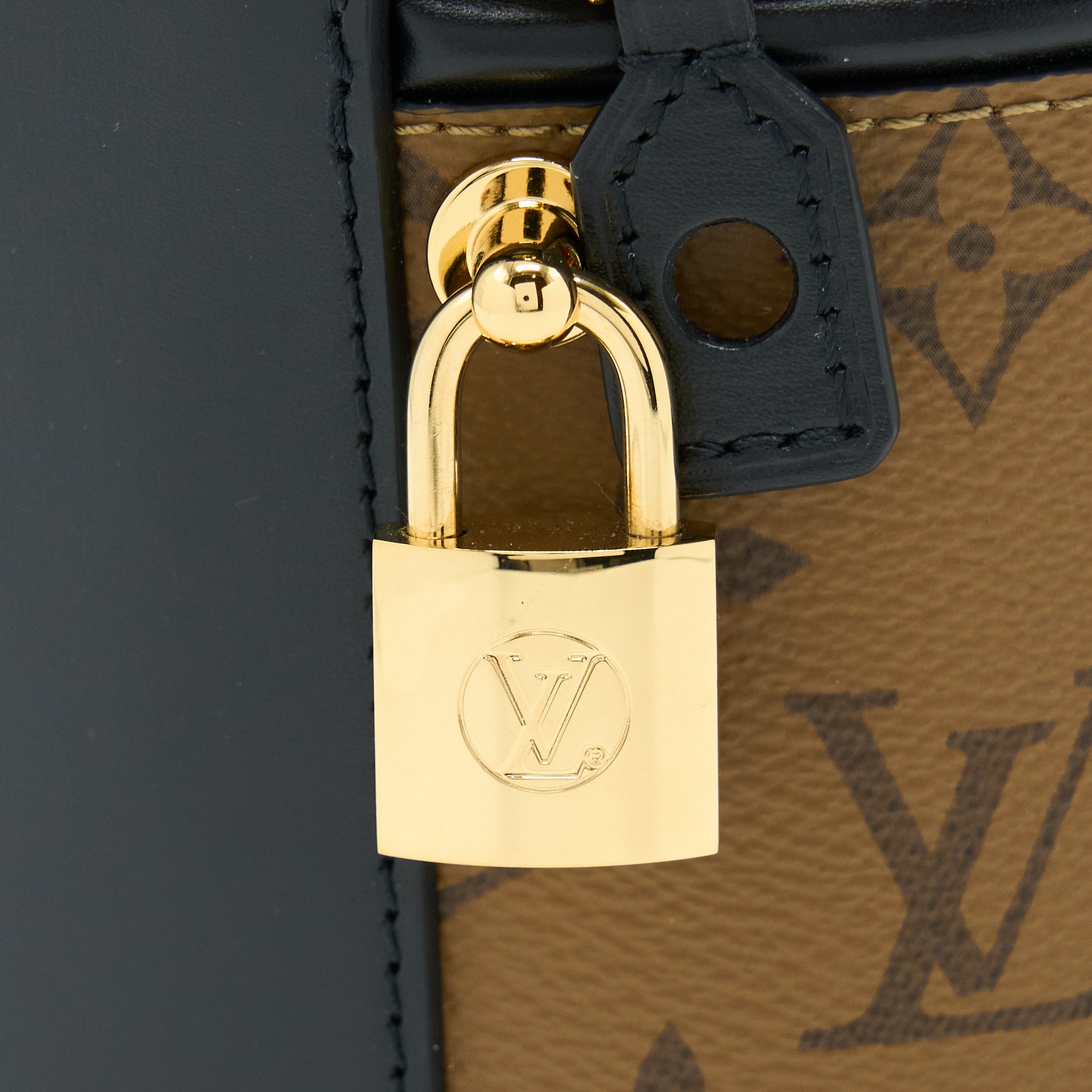 louis-vuitton-cannes-reverse-monogram-canvas-ghw-3