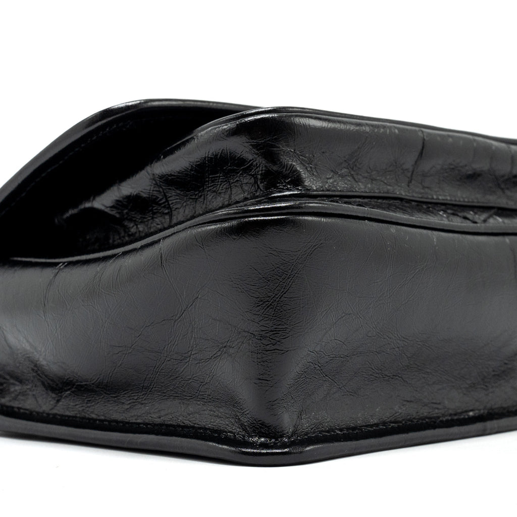 saint-laurent-niki-baby-leather-black-black-shw