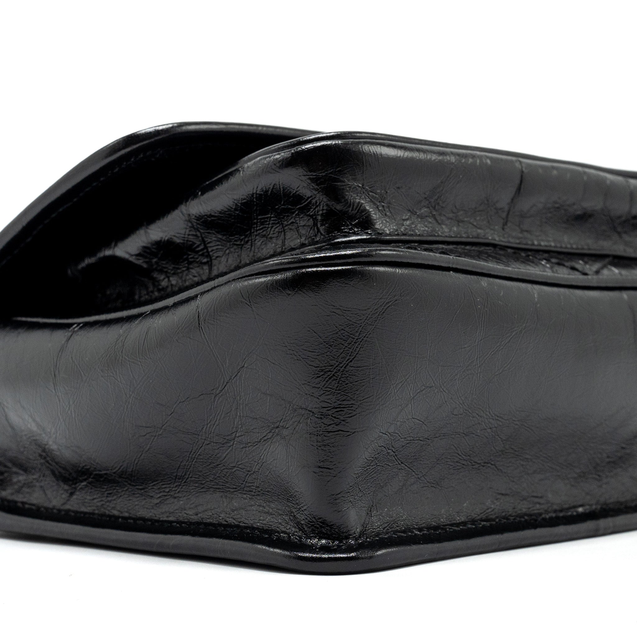 saint-laurent-niki-baby-leather-black-black-shw
