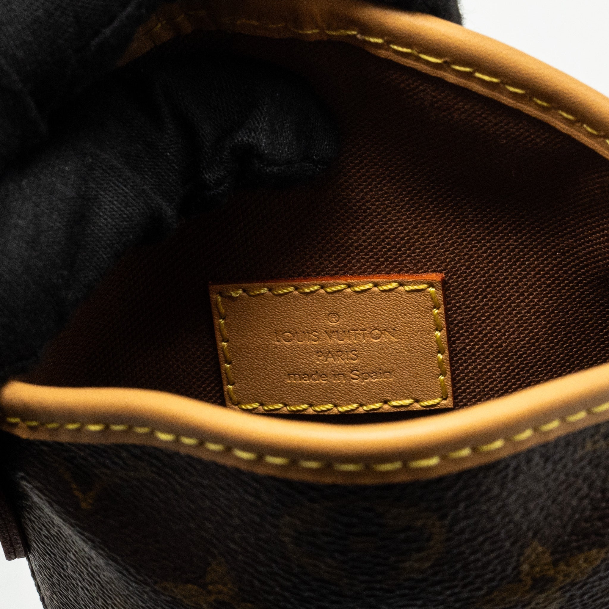 louis-vuitton-fold-me-pouch-monogram-canvas-ghw-2