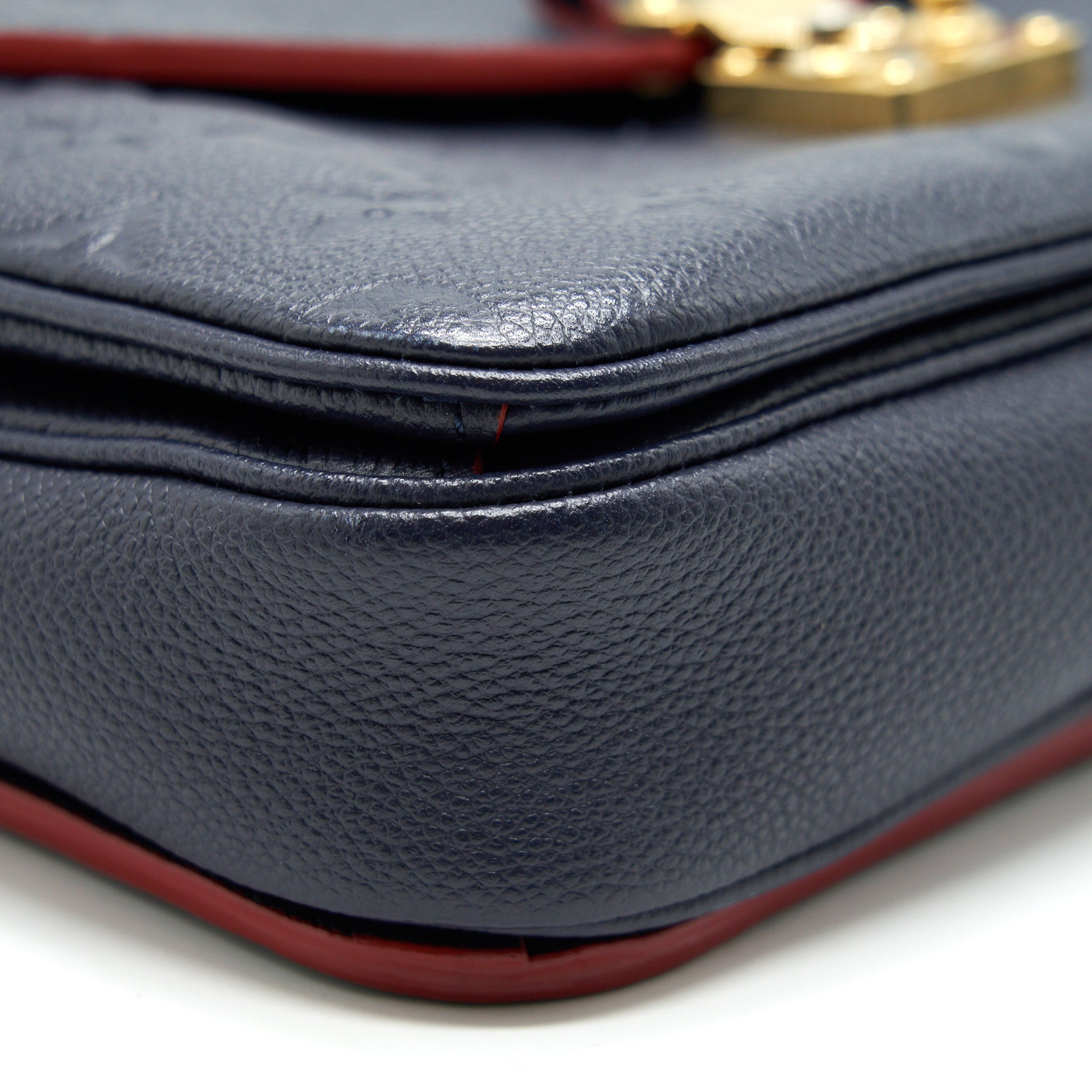 louis-vuitton-pochette-metis-marine-rouge-monogram-empreinte-leather